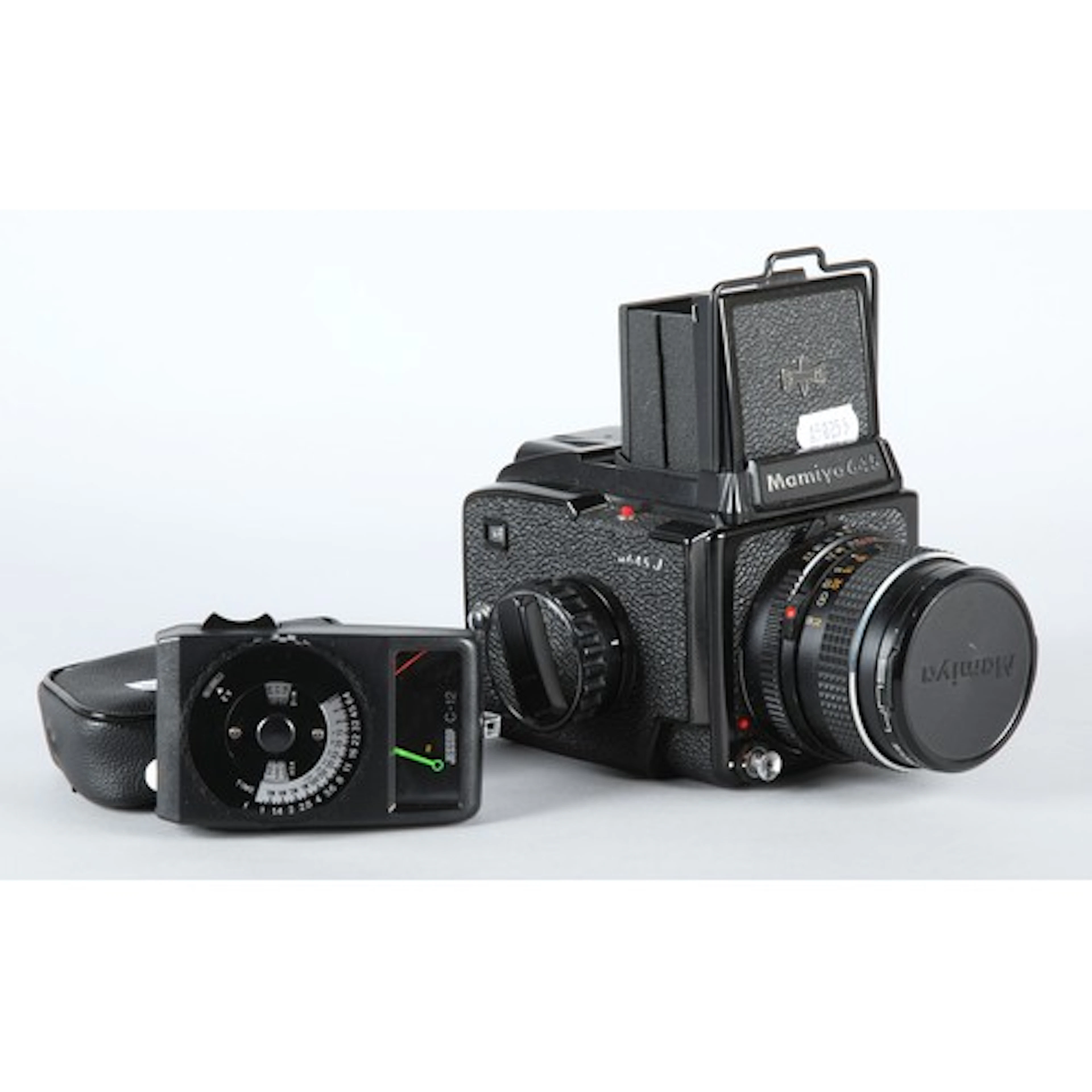 Mamiya 645J camera with a Jessops light meter.