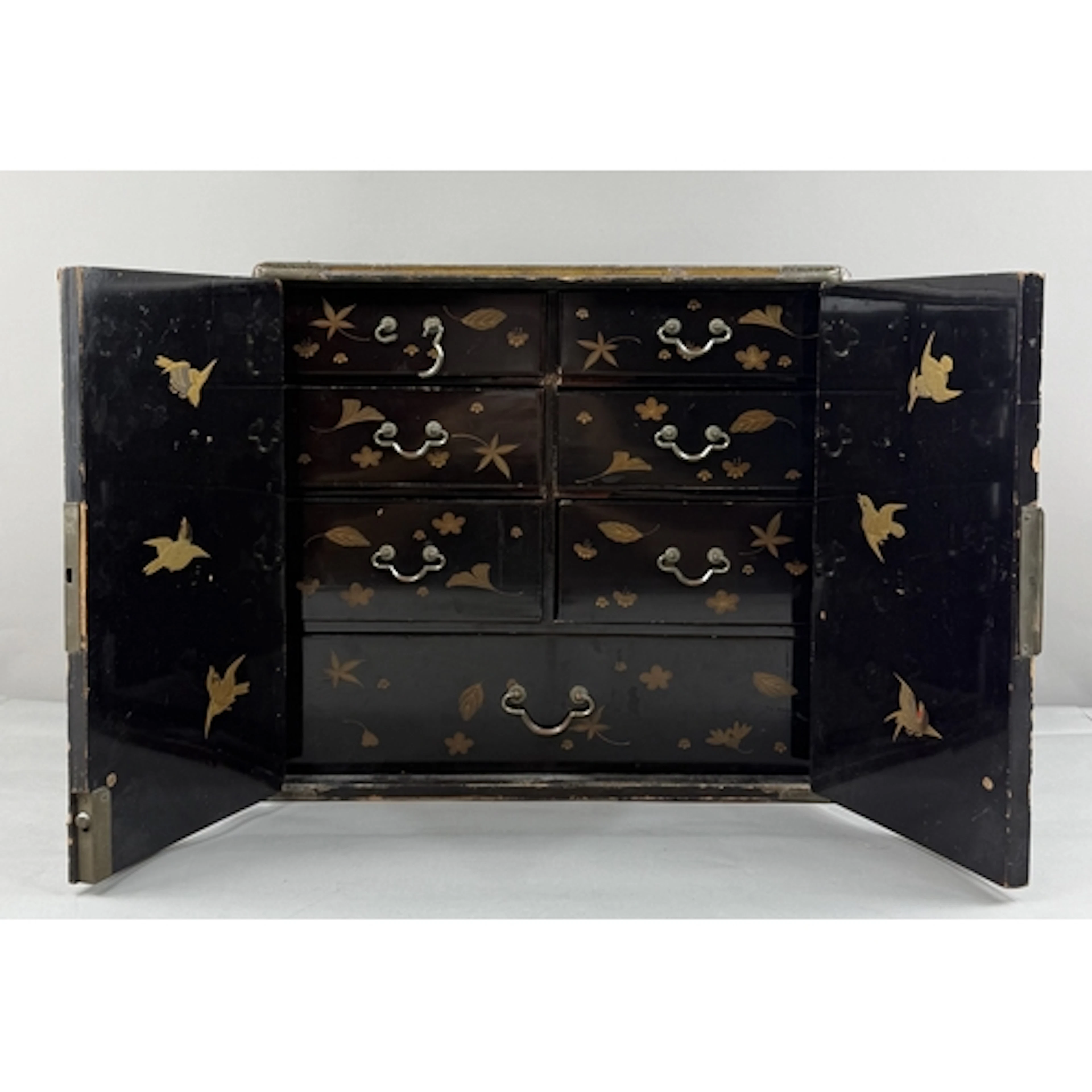 Asian Art: a Japanese black lacquer table cabinet or kodansu...