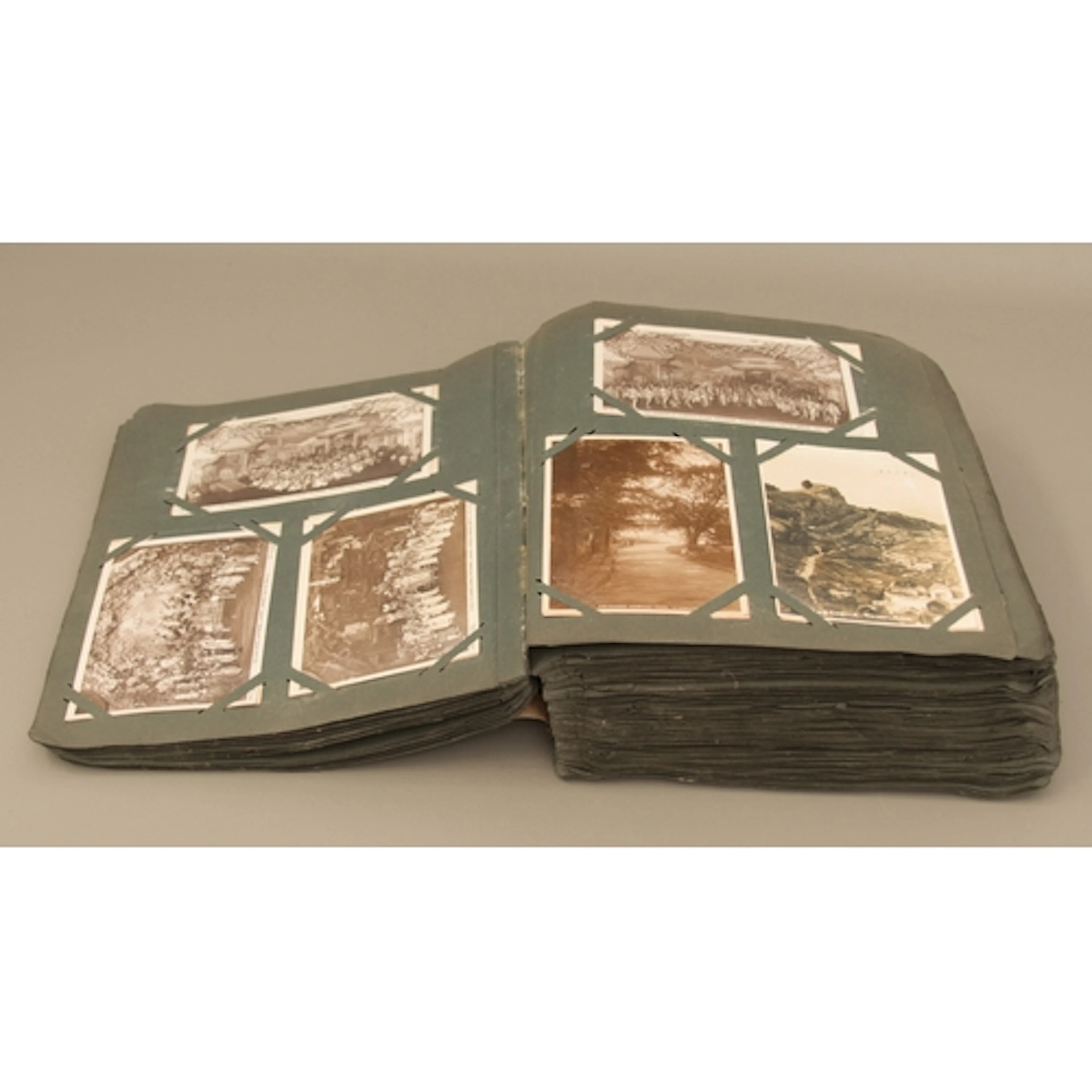 An Edwardian postcard album - over 300 postcards, mostly pre...