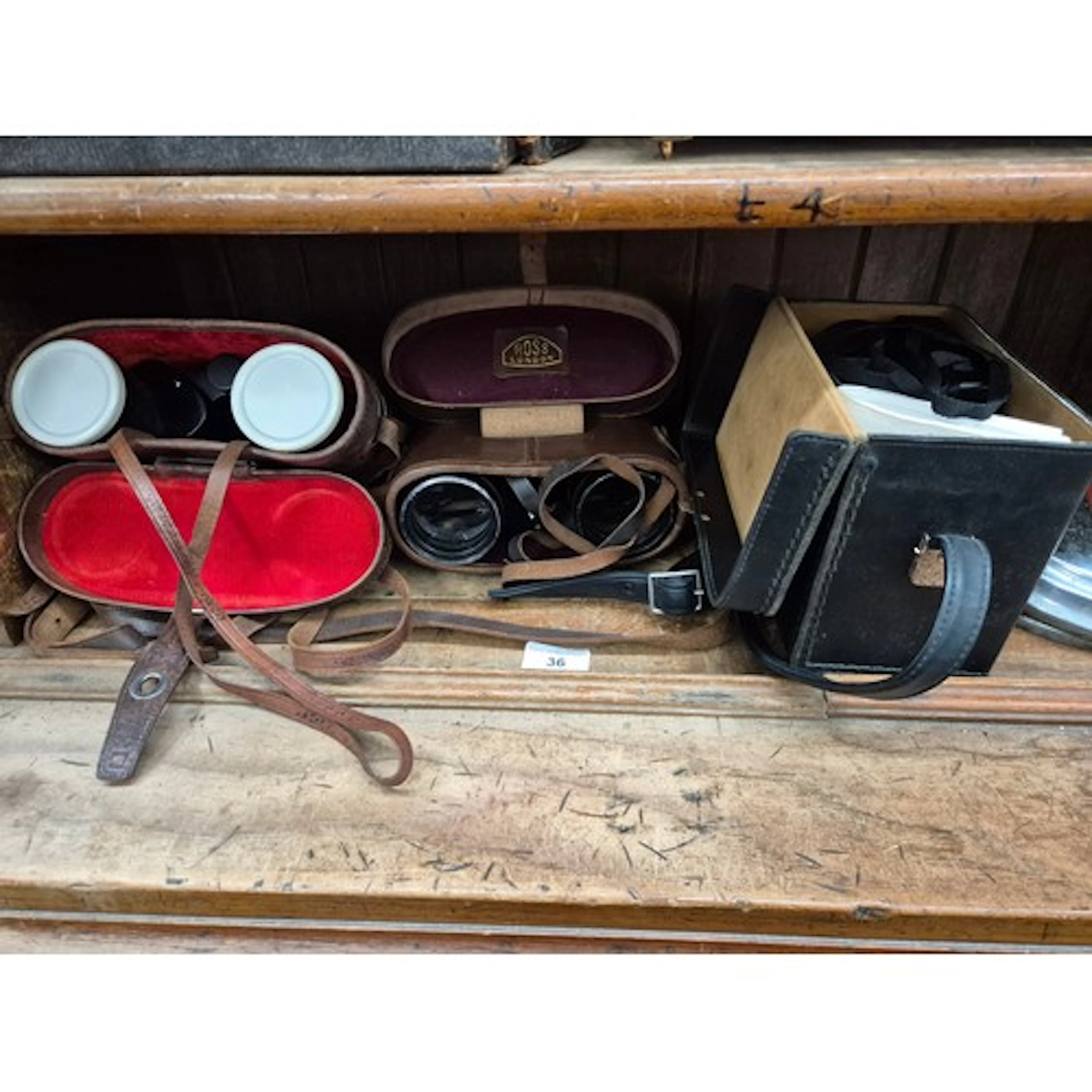 2 sets of binoculars (Ross Ensign and Wolf) and a Polaroid c...
