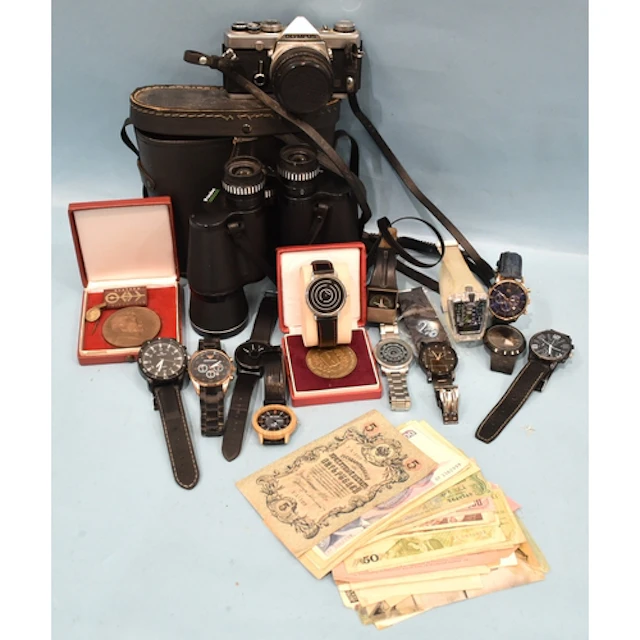 An Olympus OM-1 MD 35mm SLR camera with G Zuiko Auto-S 1:1.4...