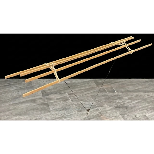 A Victorian Sheila maid, four pine beams with single cast pu...