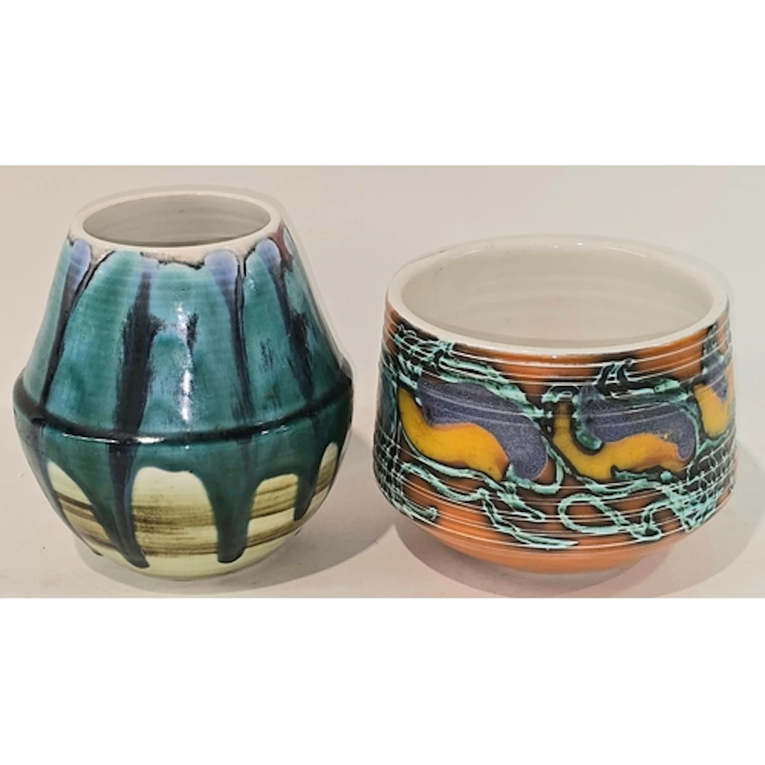Poole Pottery shape 83 Delphis vase together with a shape 92...