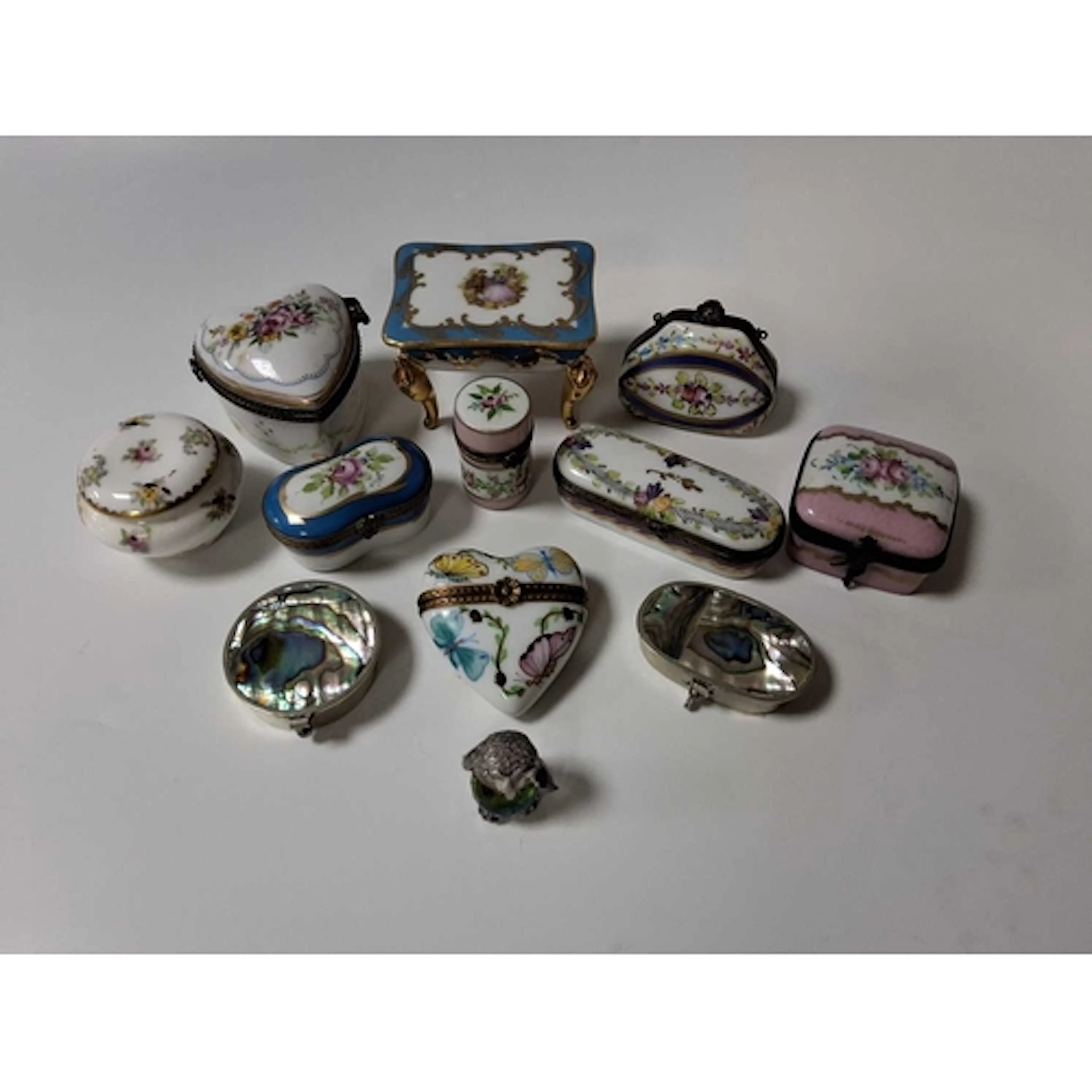 A SMALL COLLECTION OF MOSTLY LIMOGE PORCELAIN PILL POTS, to ...