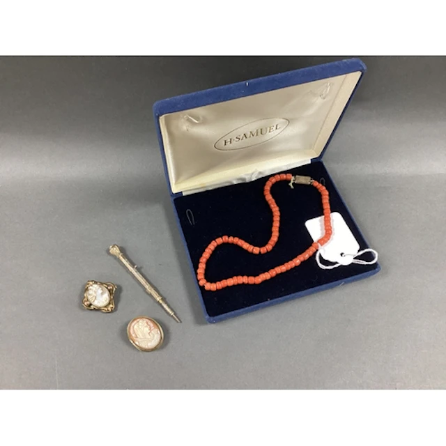 A XIX Century Coral Bead Necklace, to snap clasp with engrav...