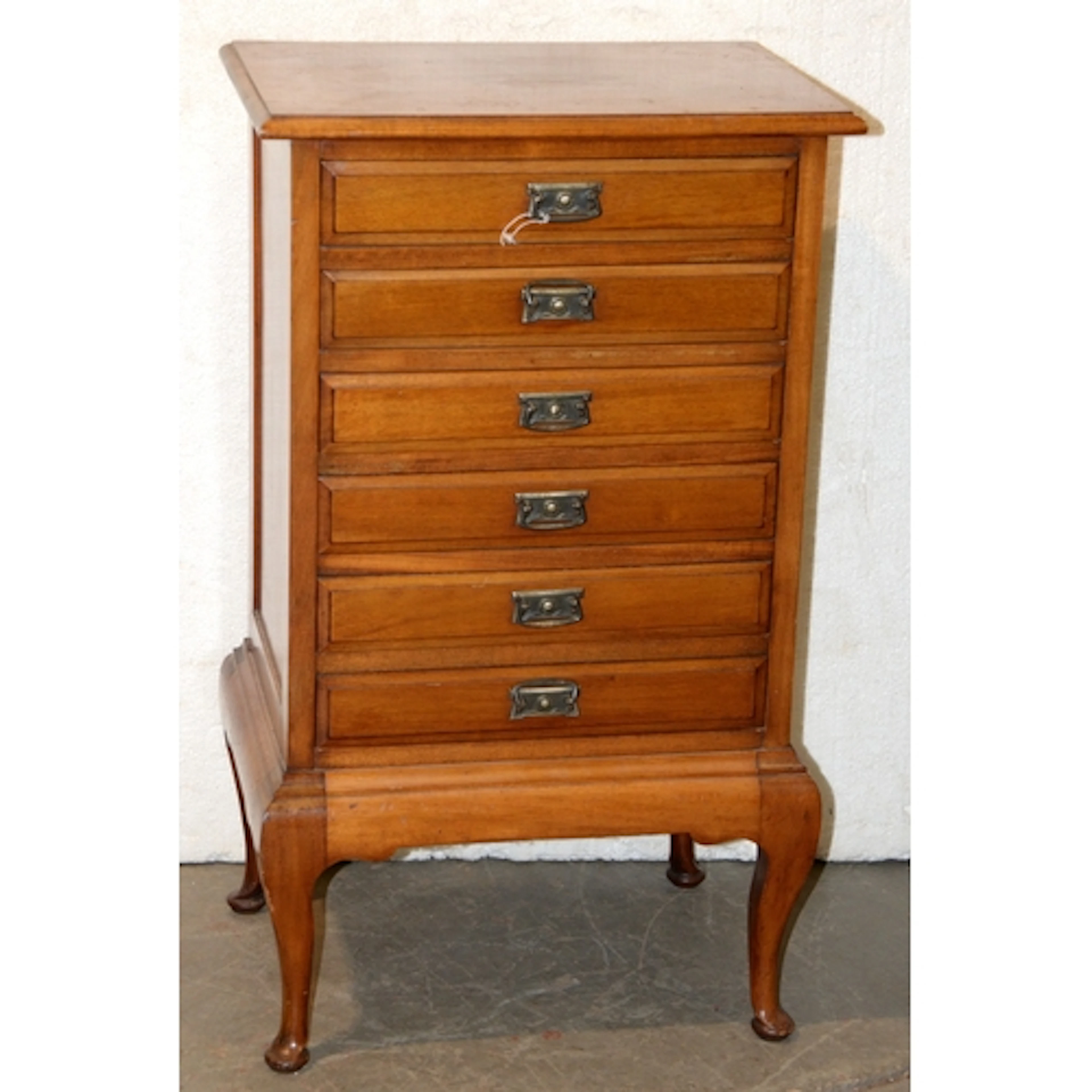 A mahogany music cabinet, early 20th c, with ivory trade lab...