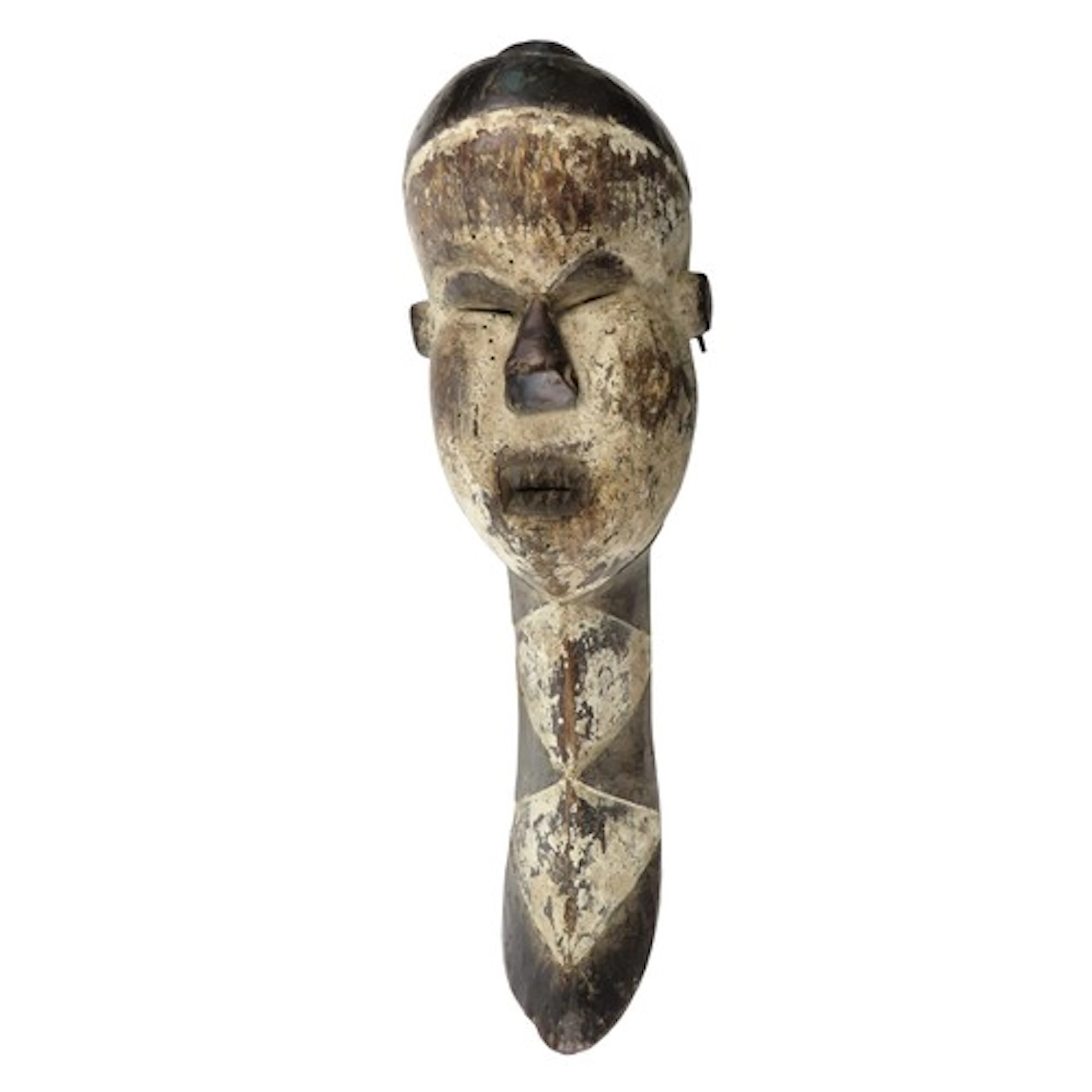 AN IGBO STYLE MASK of elongated form, the face with slit eye...