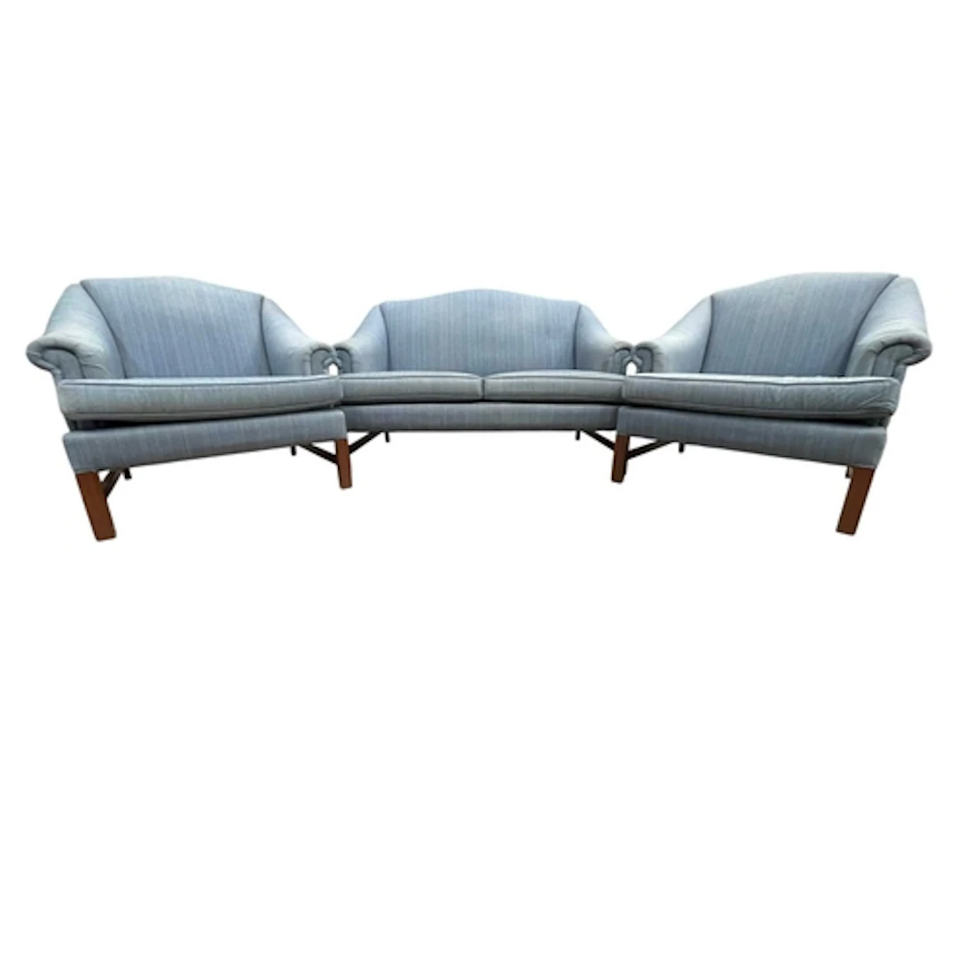 A 20th century Gainsborough style mahogany two seater sofa a...