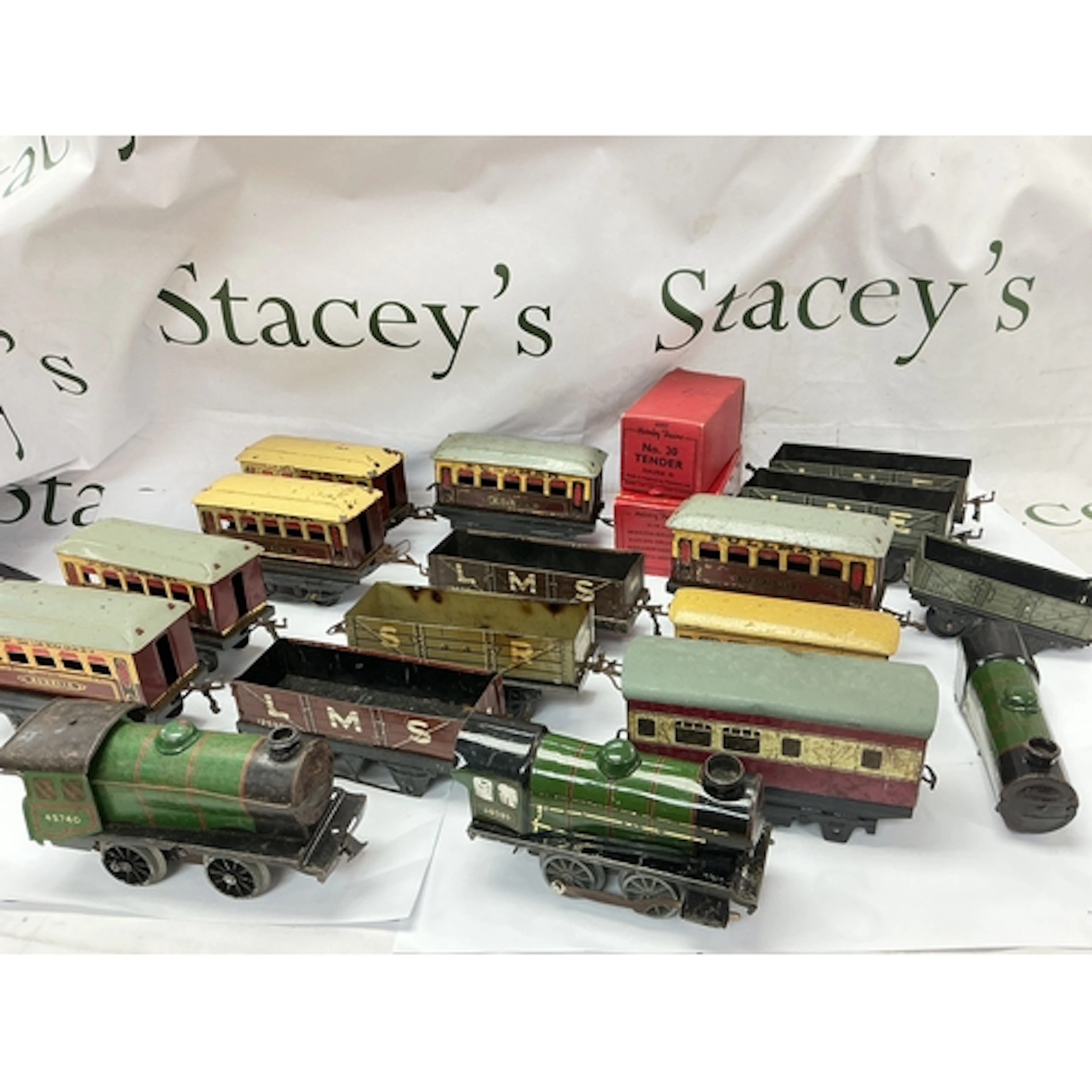 A Collection Of 0 Gauge Locos, Coaches And Wagons.