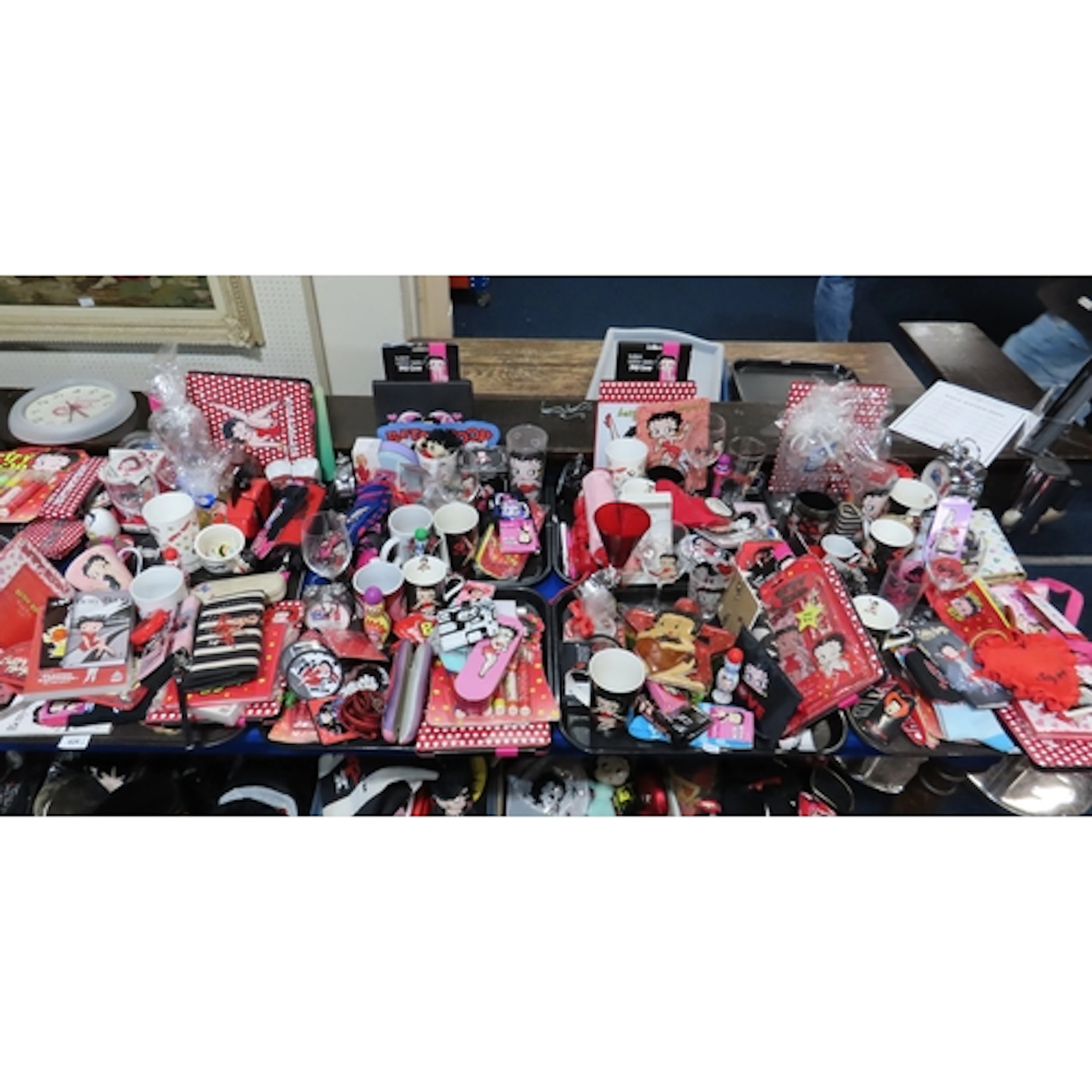 A group of Betty Boop collectables including mugs, frames, p...