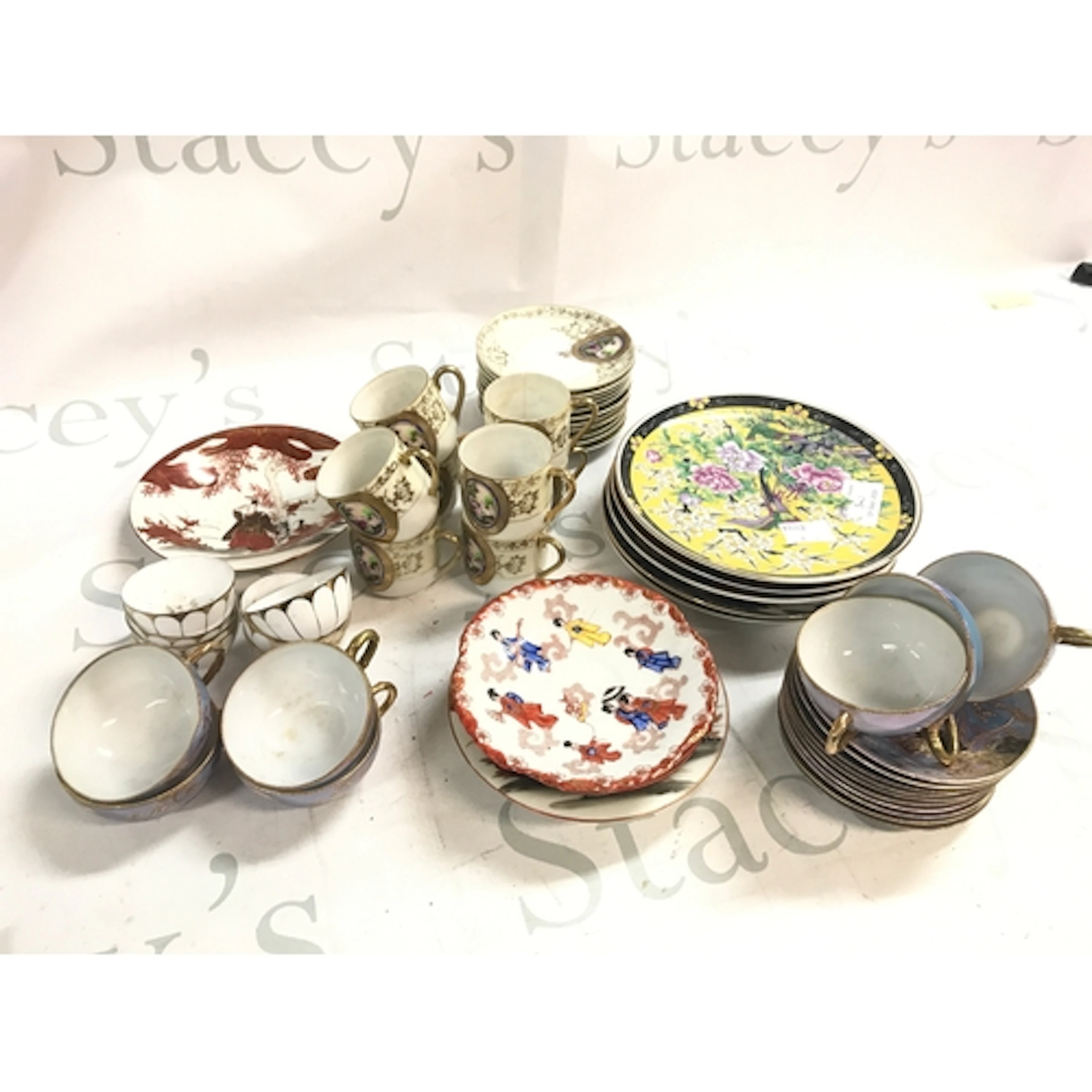 Chinese eggshell porcelain tea sets including cups, saucers,...