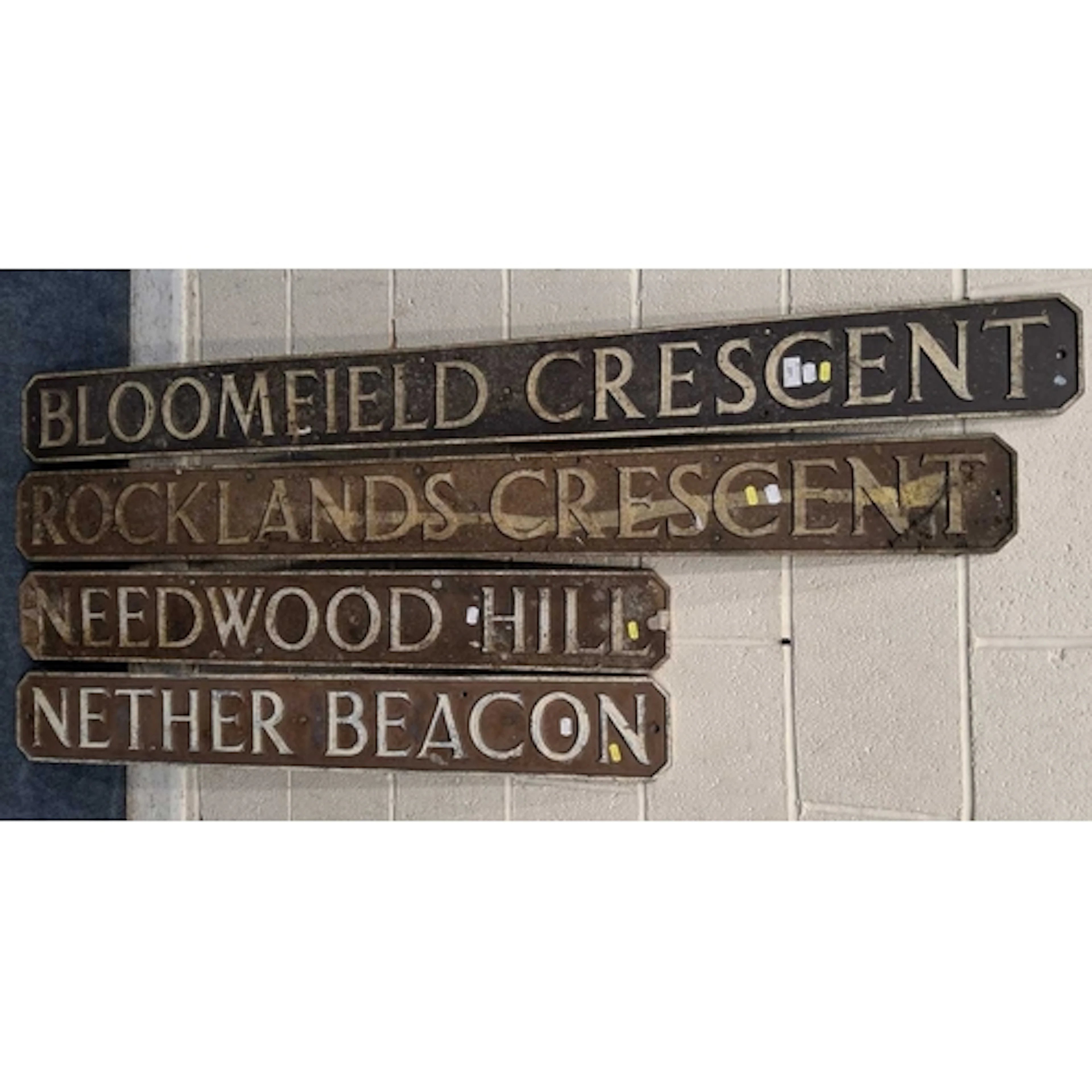 FOUR METAL ROAD SIGNS, varying in size and location (longes...