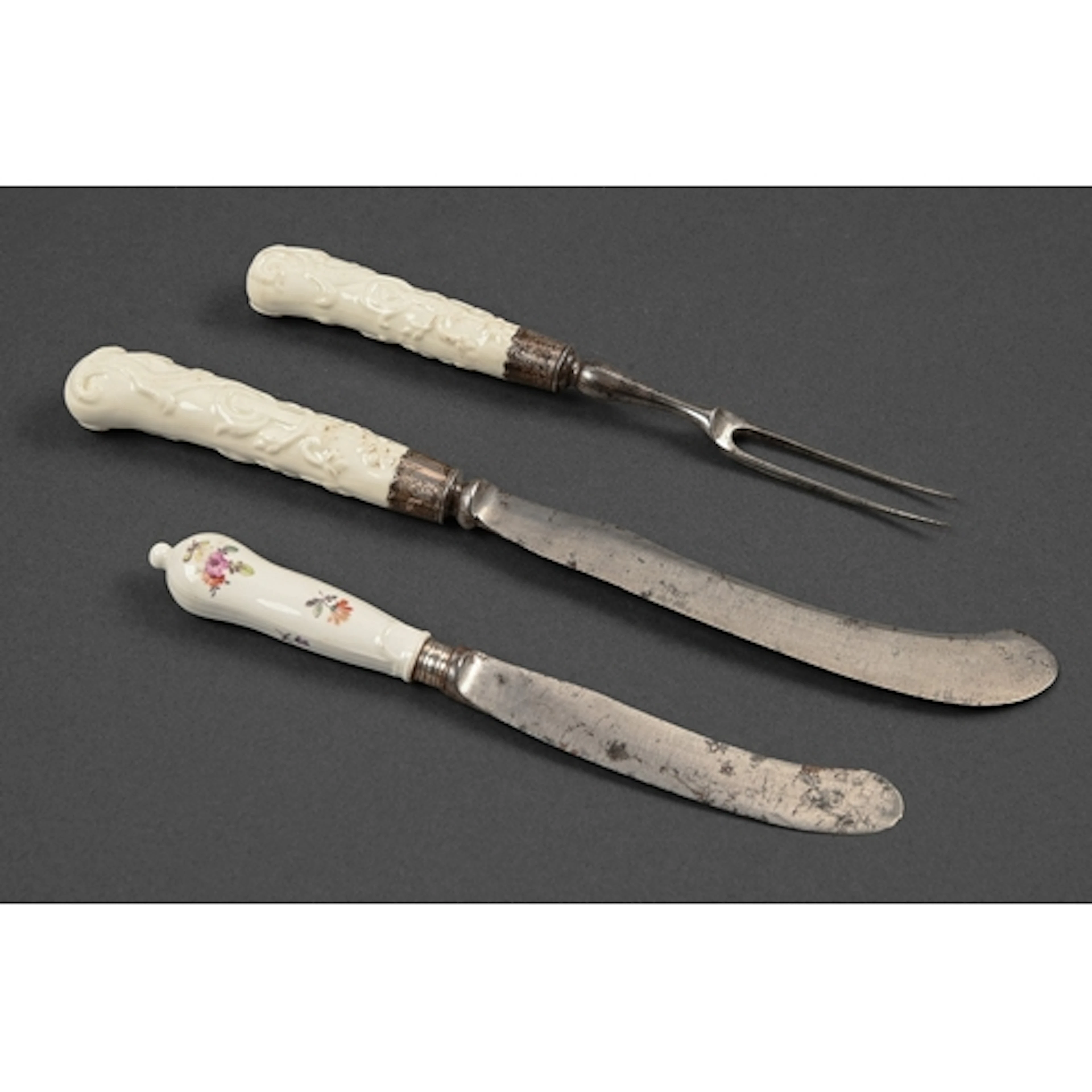 A Bow porcelain hafted knife and fork, c1750-1755, of pistol...