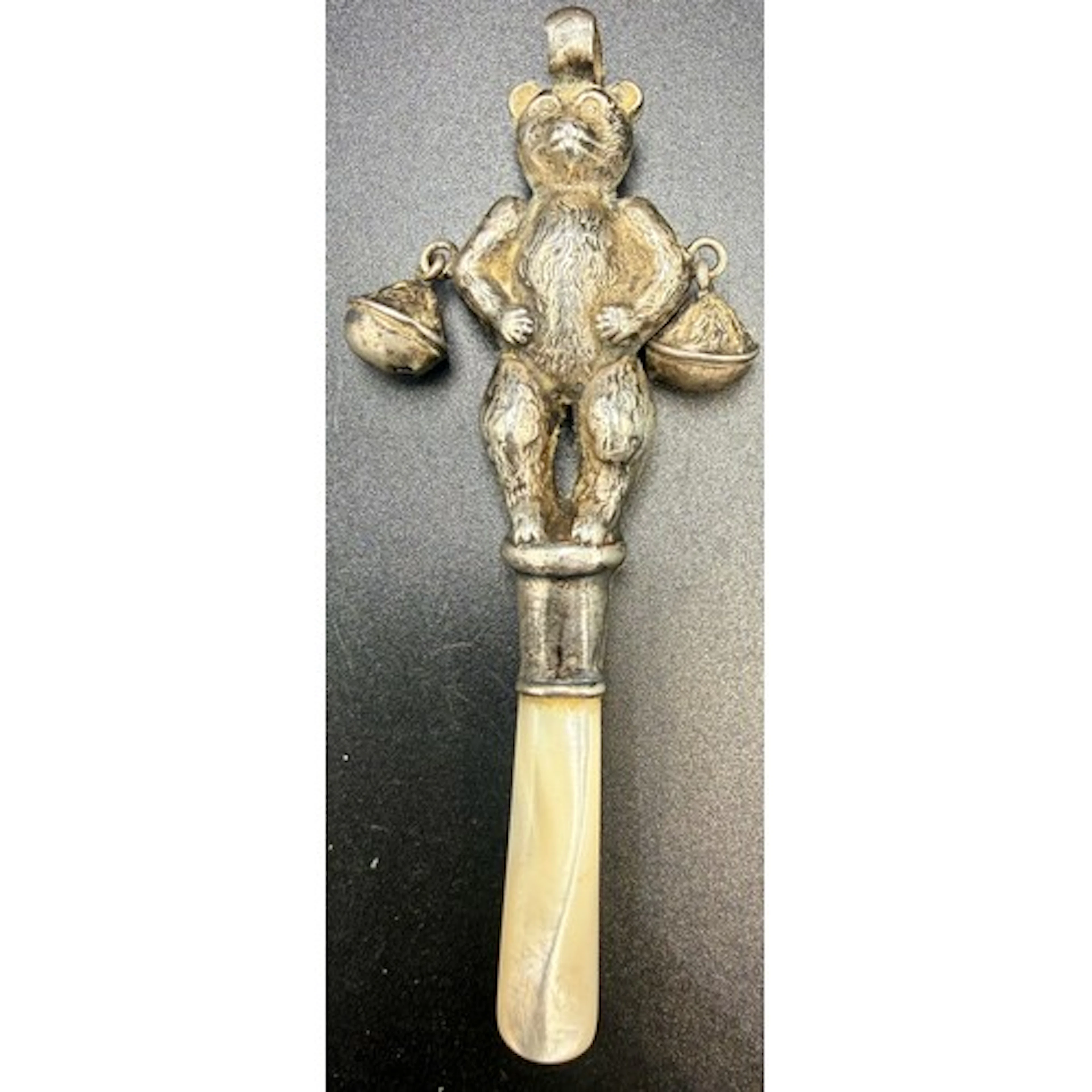 Hallmarked silver baby’s rattle in the form of a teddy bear ...