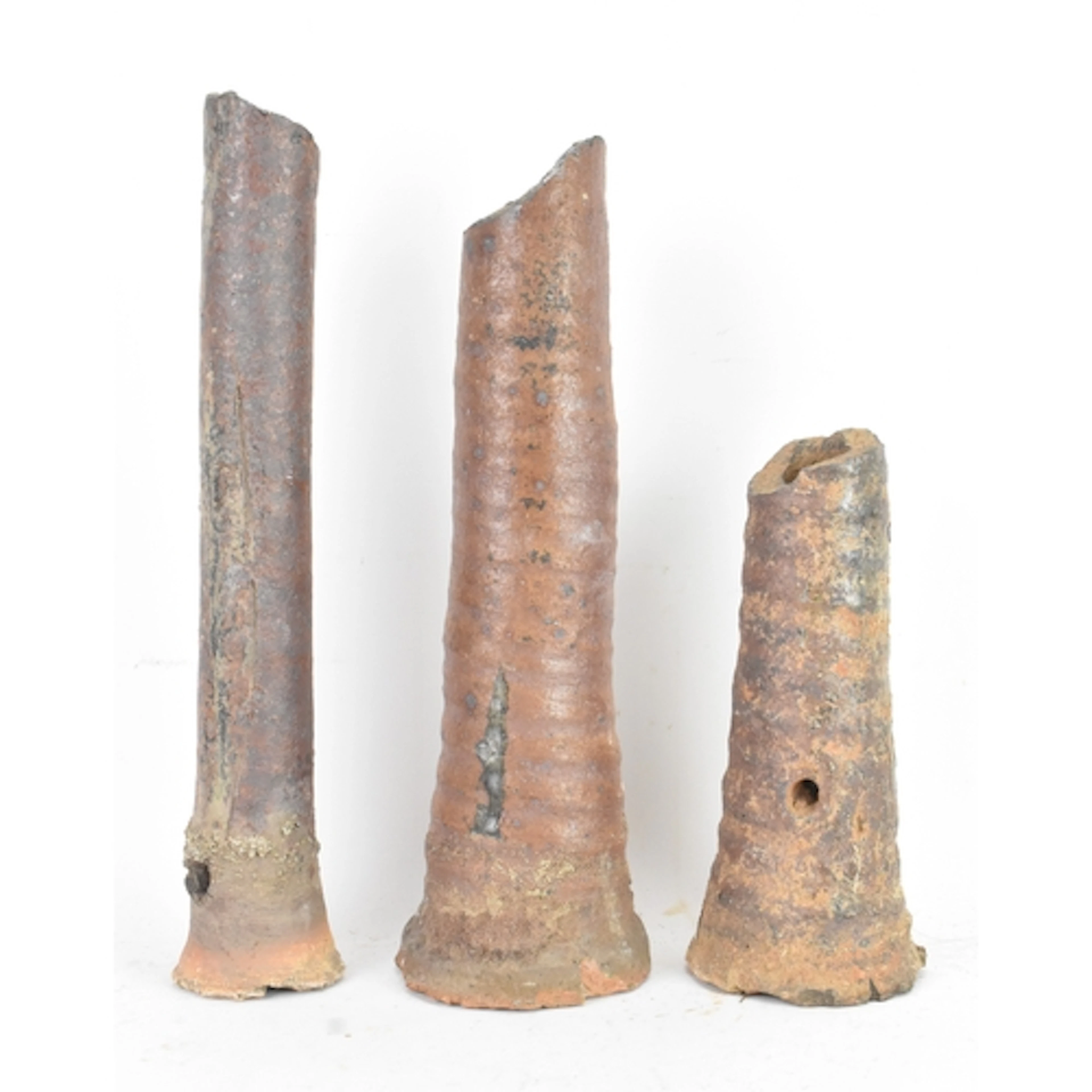 A group of three South East Asian terracotta kiln firing sup...