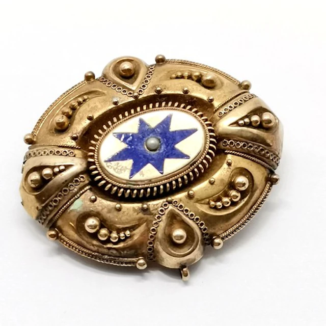 Antique unmarked (touch tests as 14ct or higher) gold locket...