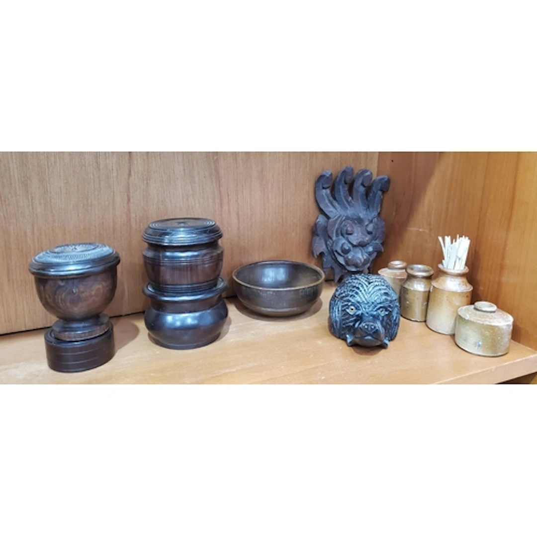 Four stoneware Ink Bottles, a carved hedgehog Inkwell, carve...