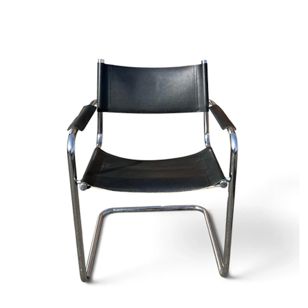 AFTER MARCEL BREUER: A BLACK LEATHER AND CHROME S34 CHAIR 80...