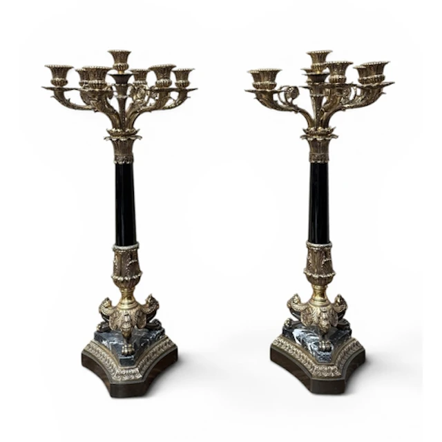 A PAIR OF EMPIRE STYLE BRASS CANDELABRA ON MARBLE AND BRONZE...