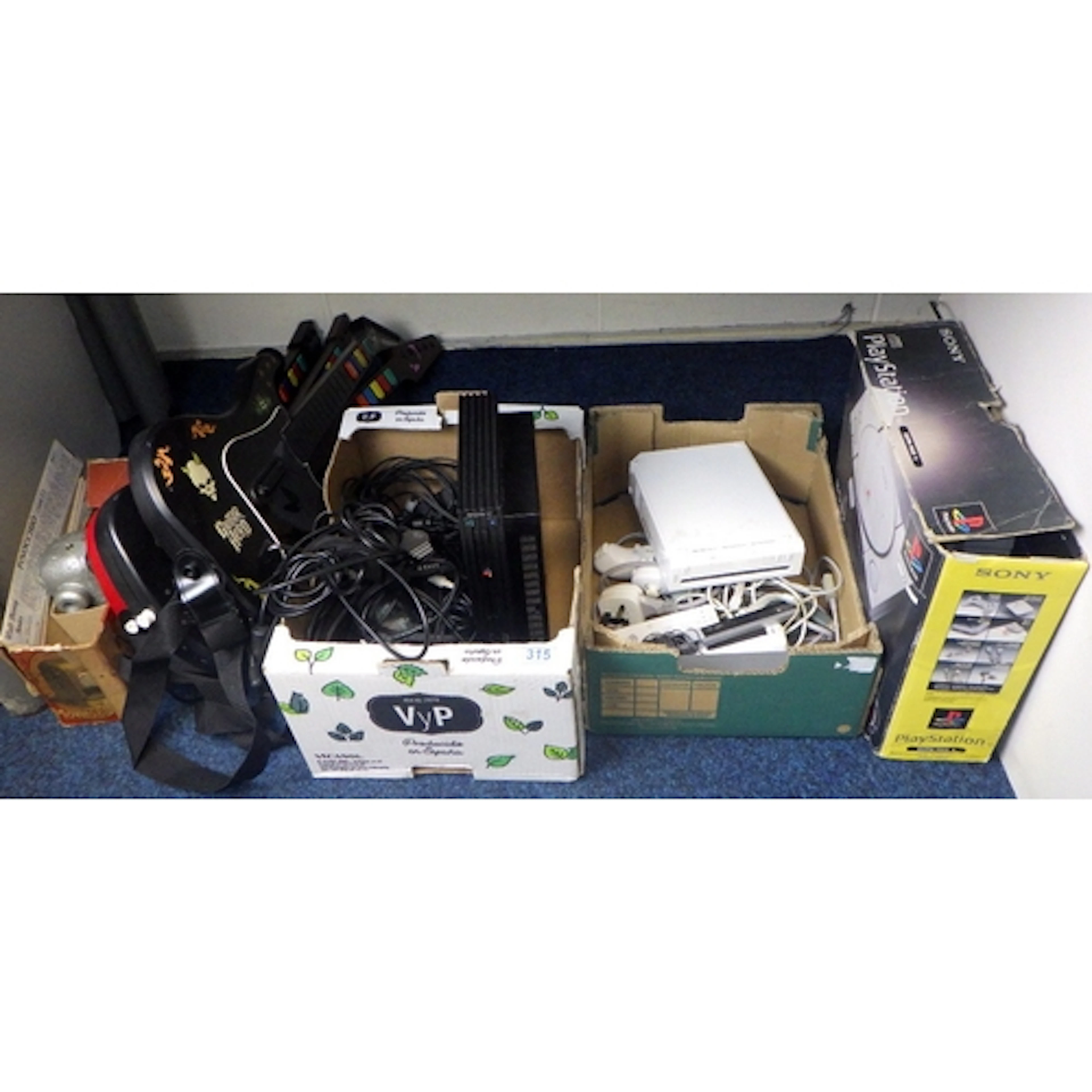 A PlayStation, Wii and accessories together with Mini Cine M...