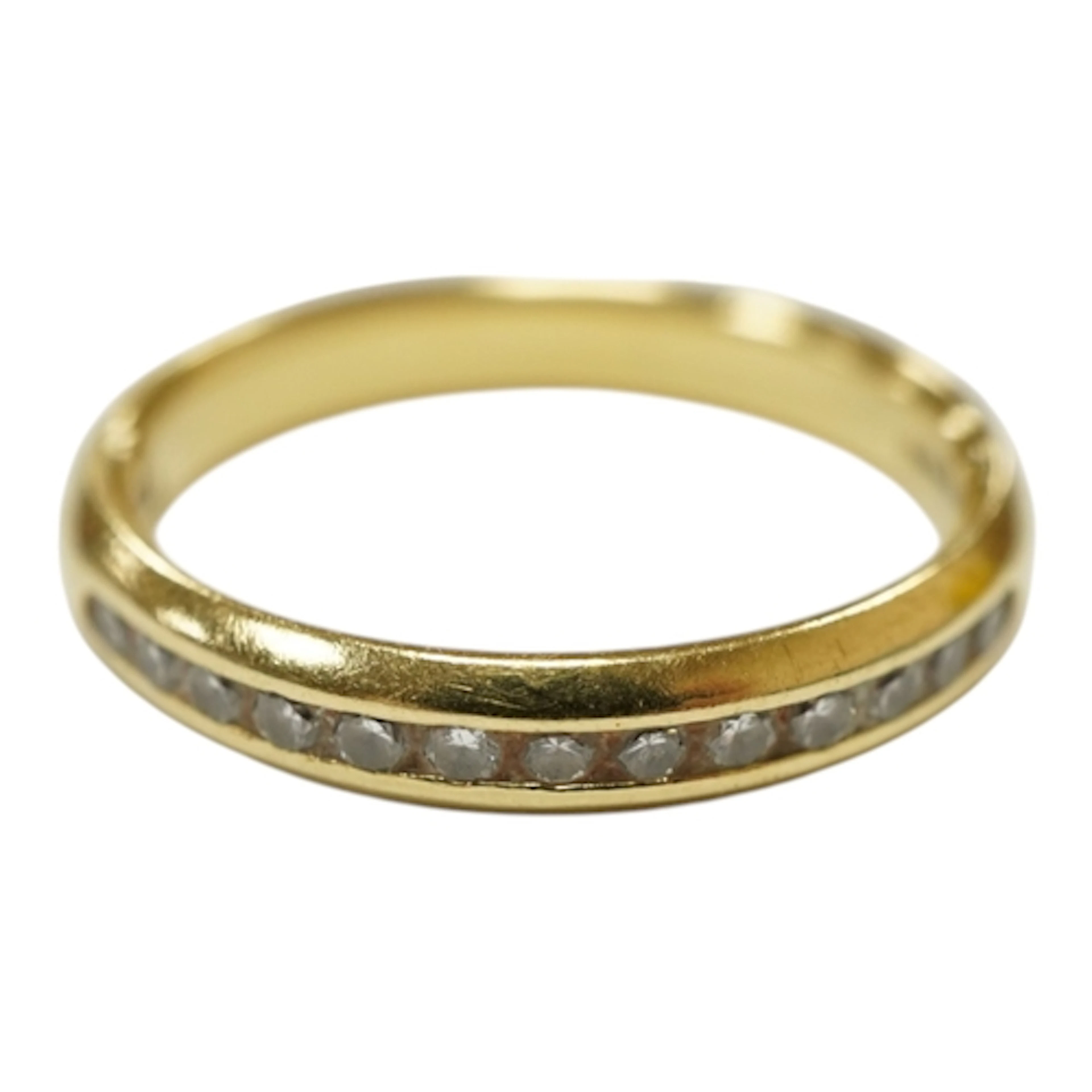 A recent 18ct gold and channel set thirteen stone diamond ch...