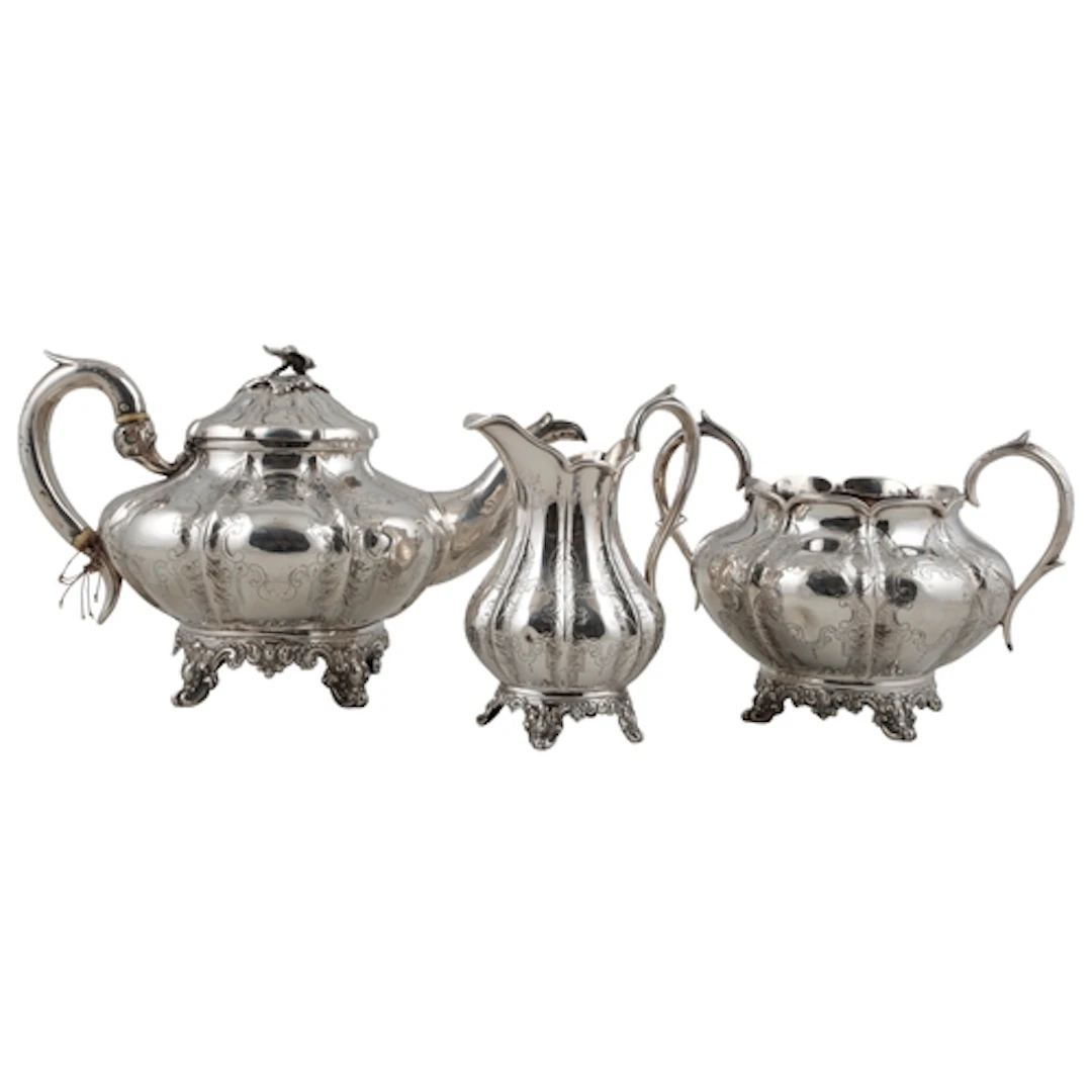An early Victorian silver three piece tea set, by John Wellb...