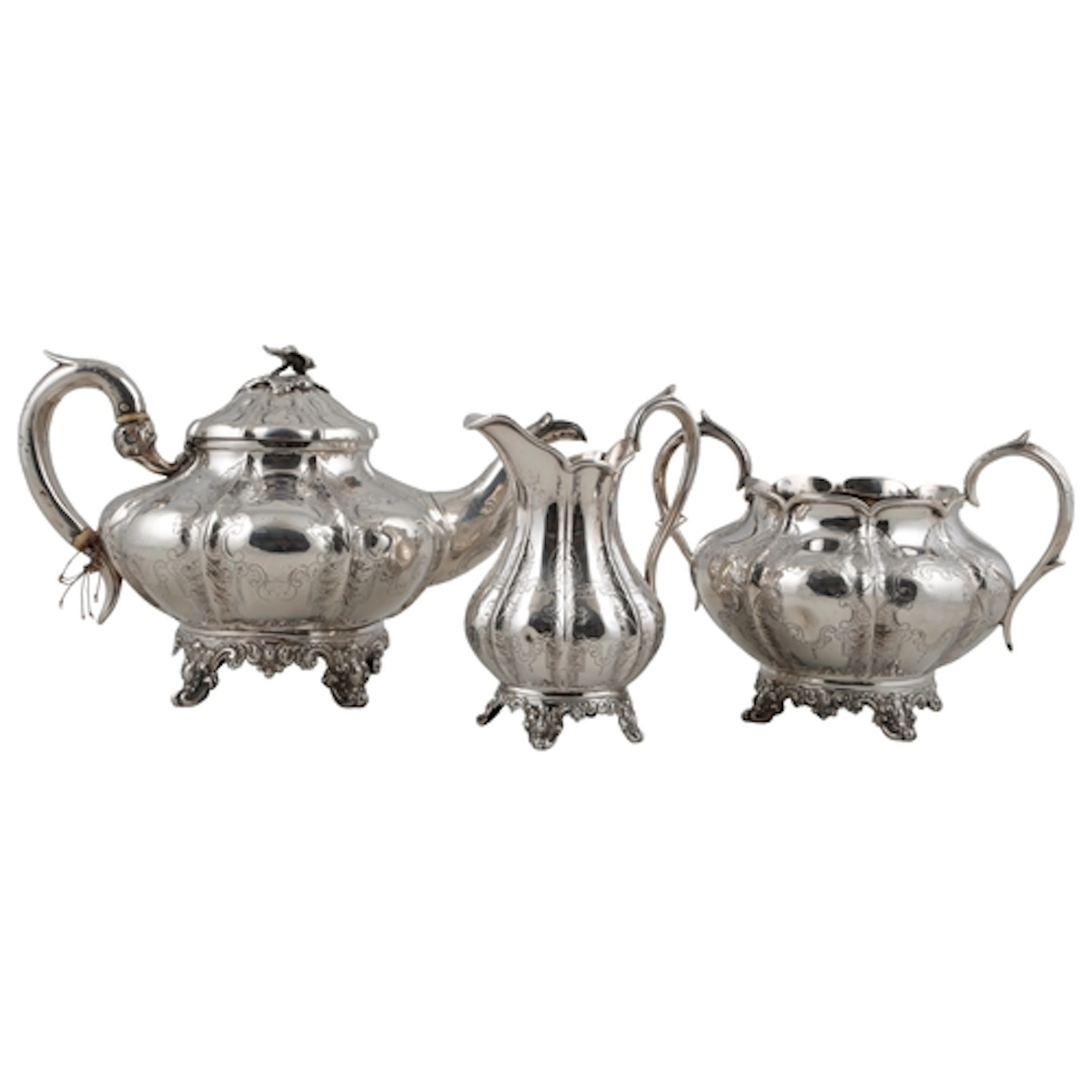 An early Victorian silver three piece tea set, by John Wellb...