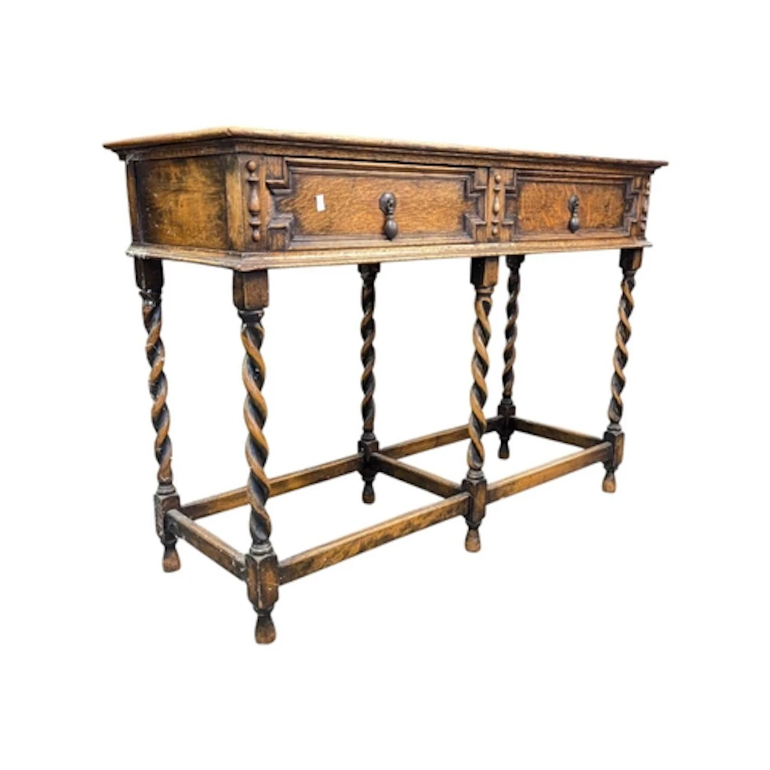 An early 20th century Jacobean oak writing hall console tabl...