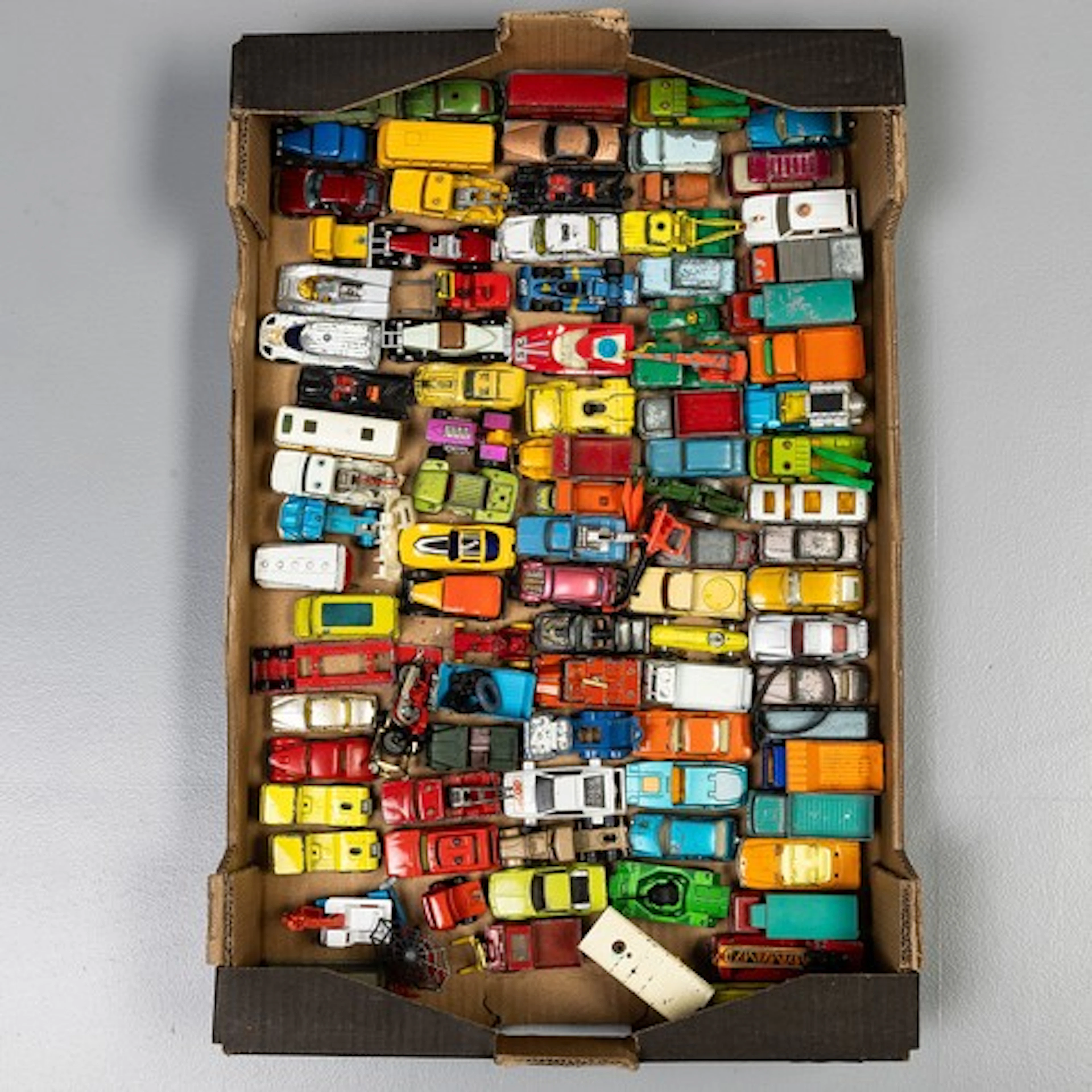 Fruit tray of playworn, Matchbox, Corgi Juniors, and Husky d...