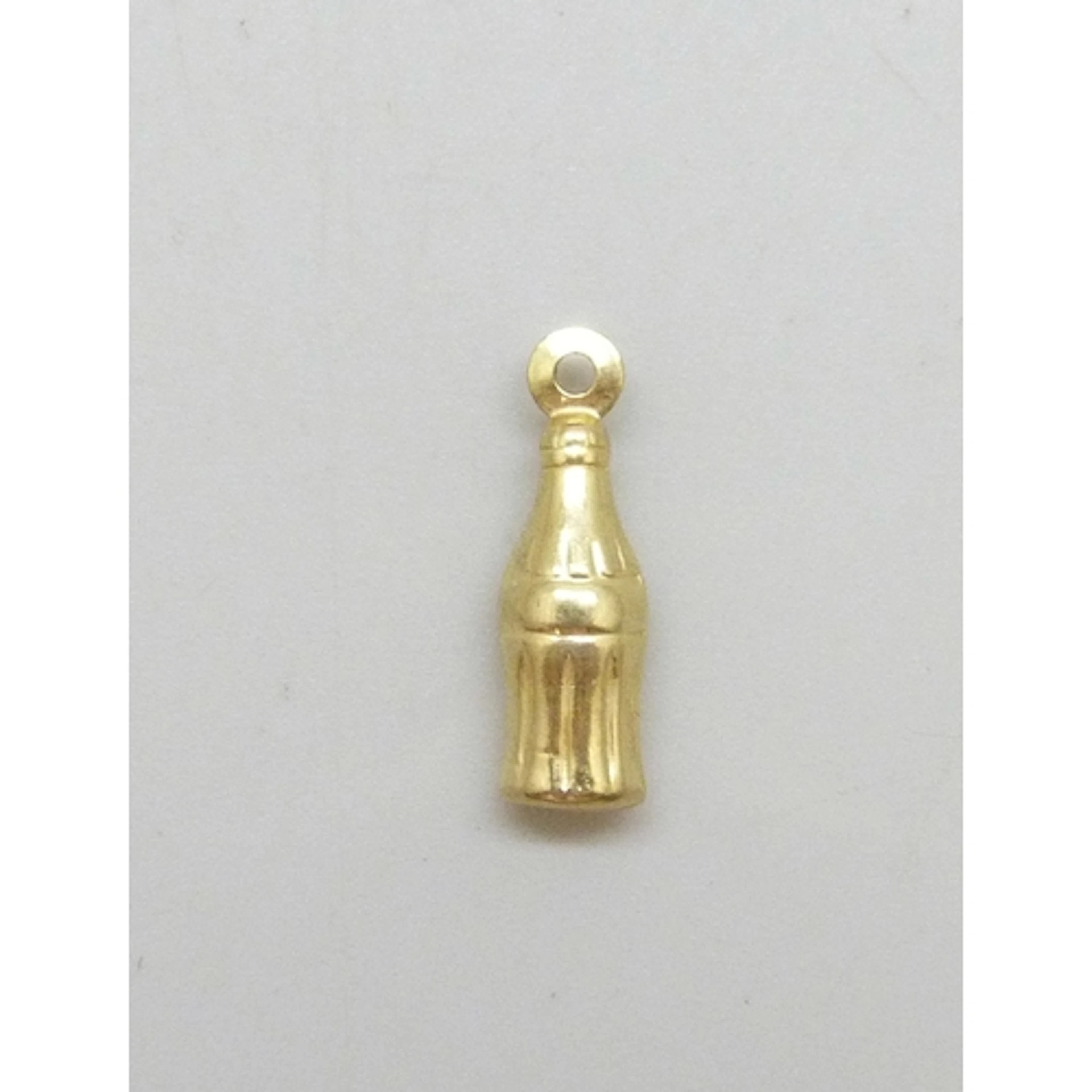 A yellow metal charm in the form of a Coca Cola style bottle...