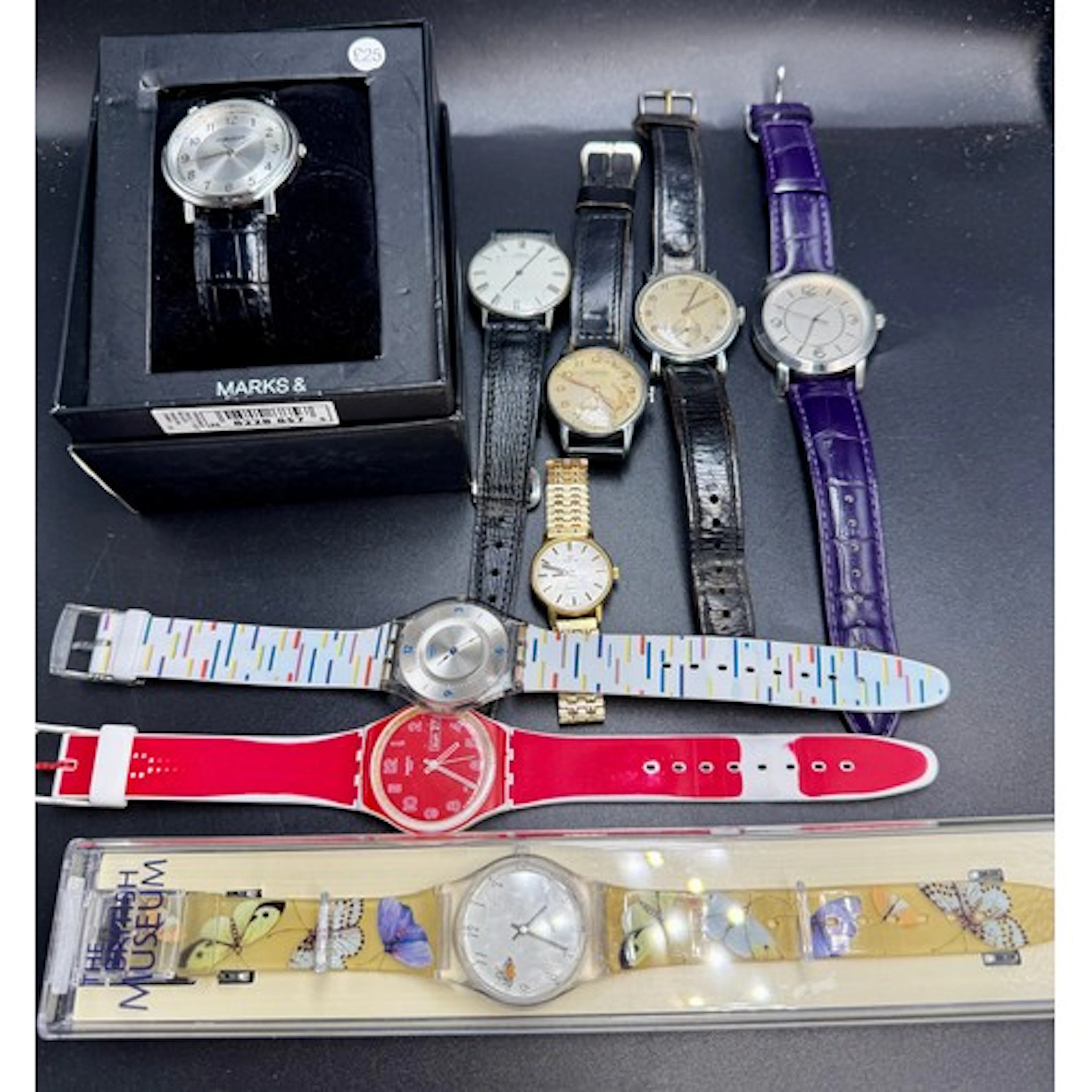 A collection of vintage wristwatches to include Swatch, Omeg...