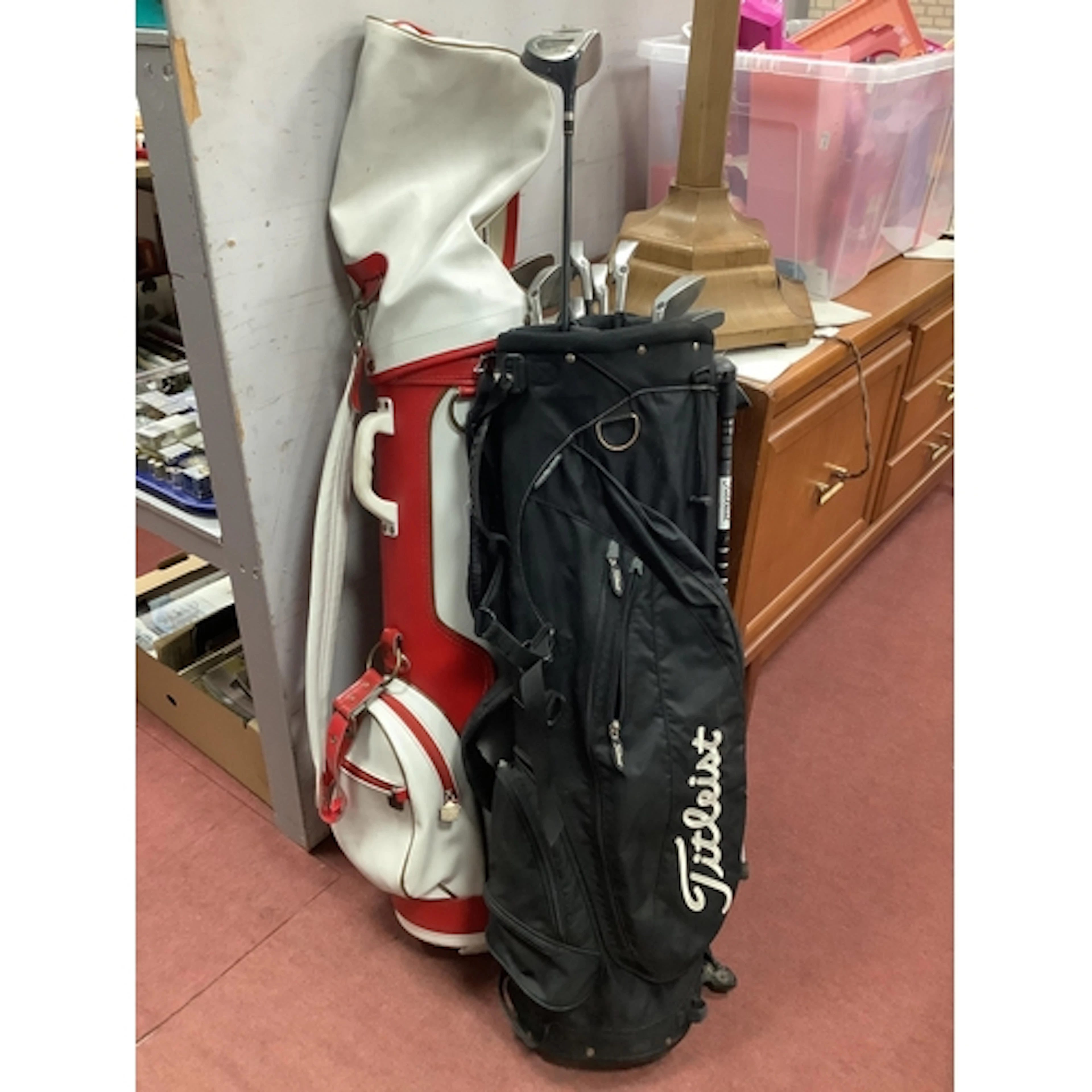Two Golf Trolley Bags Containing Various Golf Clubs, mainly ...