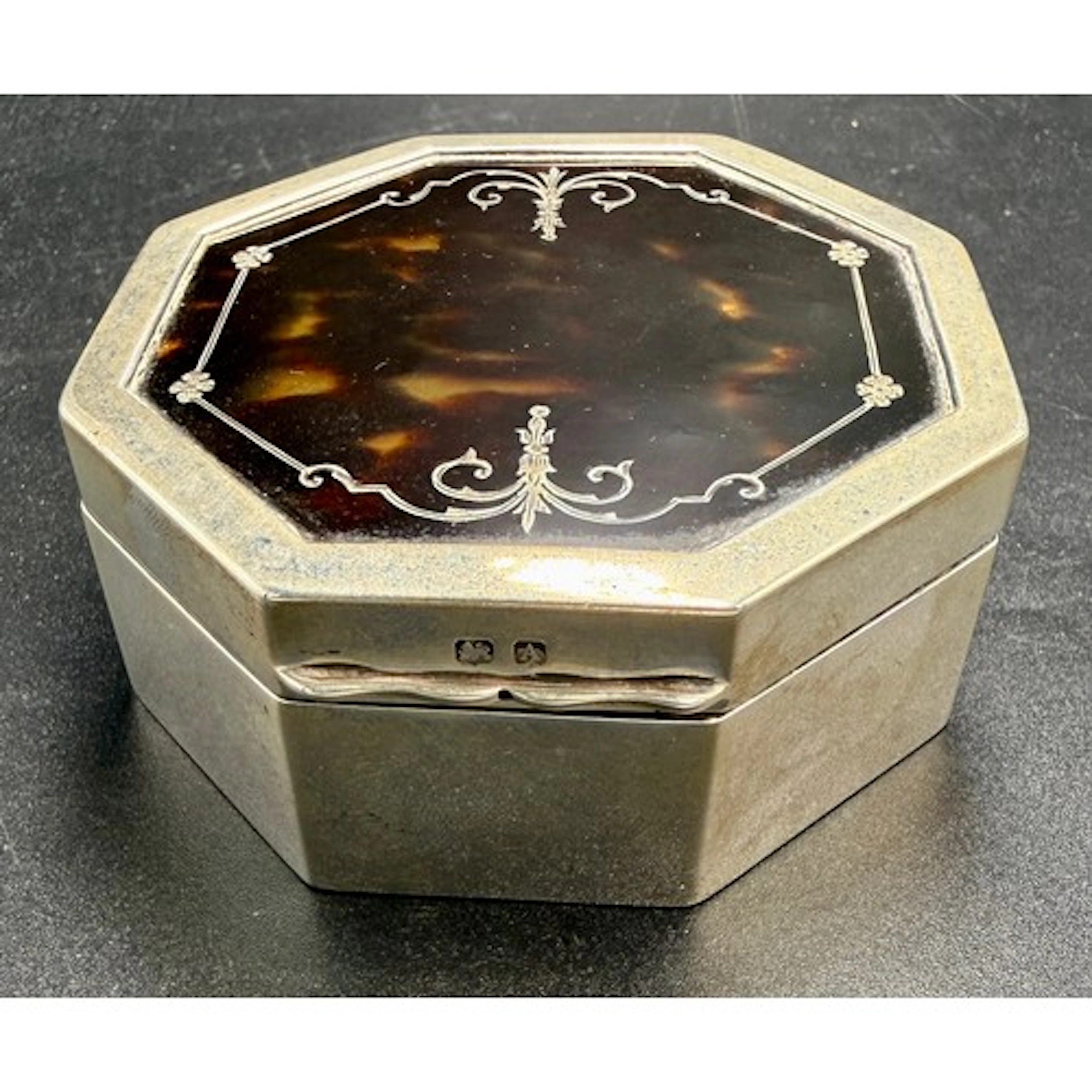 A hallmarked silver and tortoiseshell octagonal silk lined j...