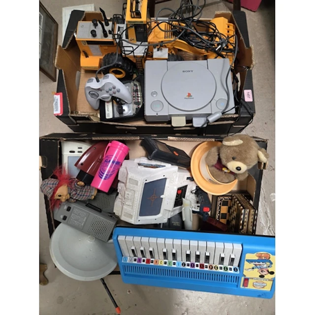 A Playstation One and a selection of vintage games toys etc