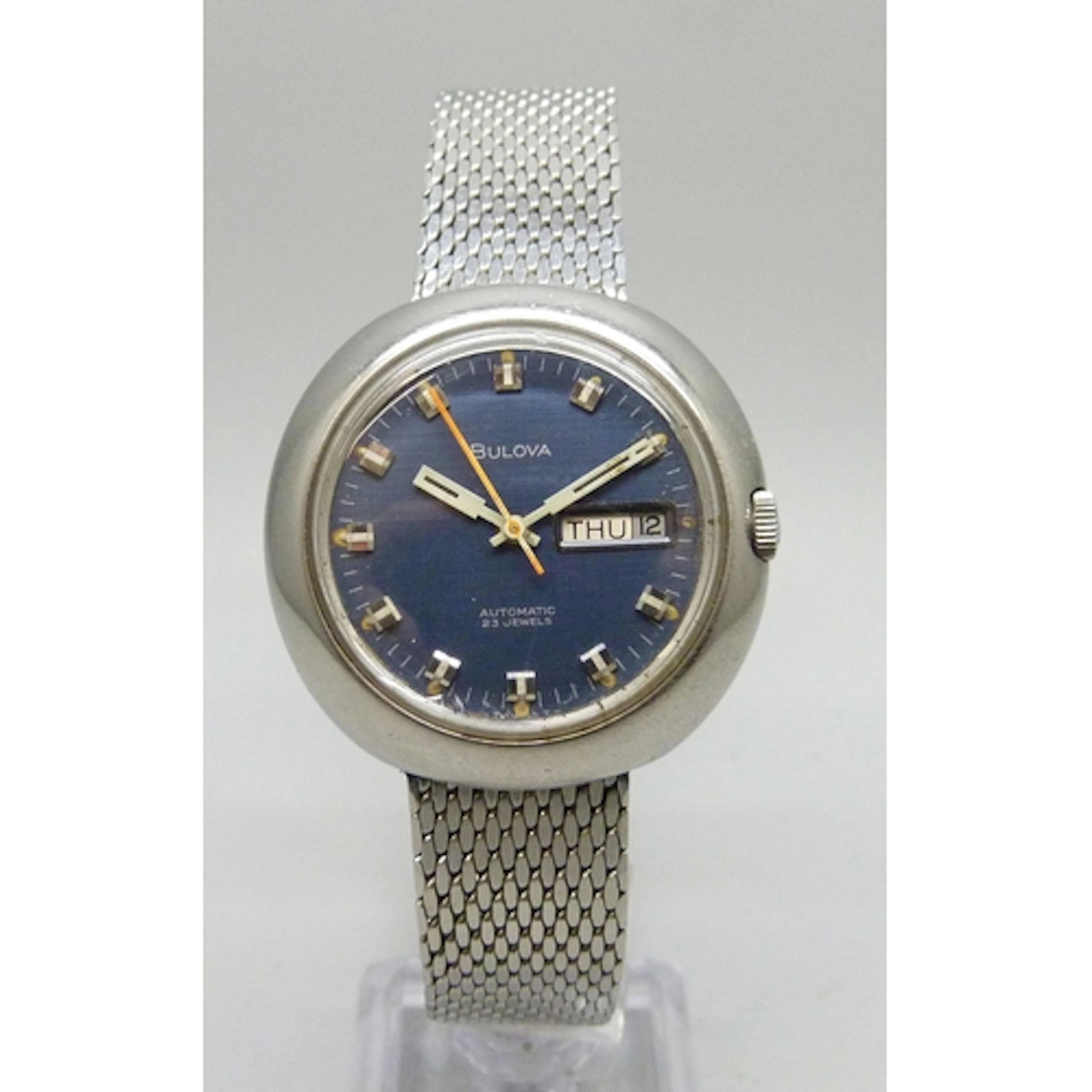 A Bulova automatic wristwatch with blue dial and day/date ap...