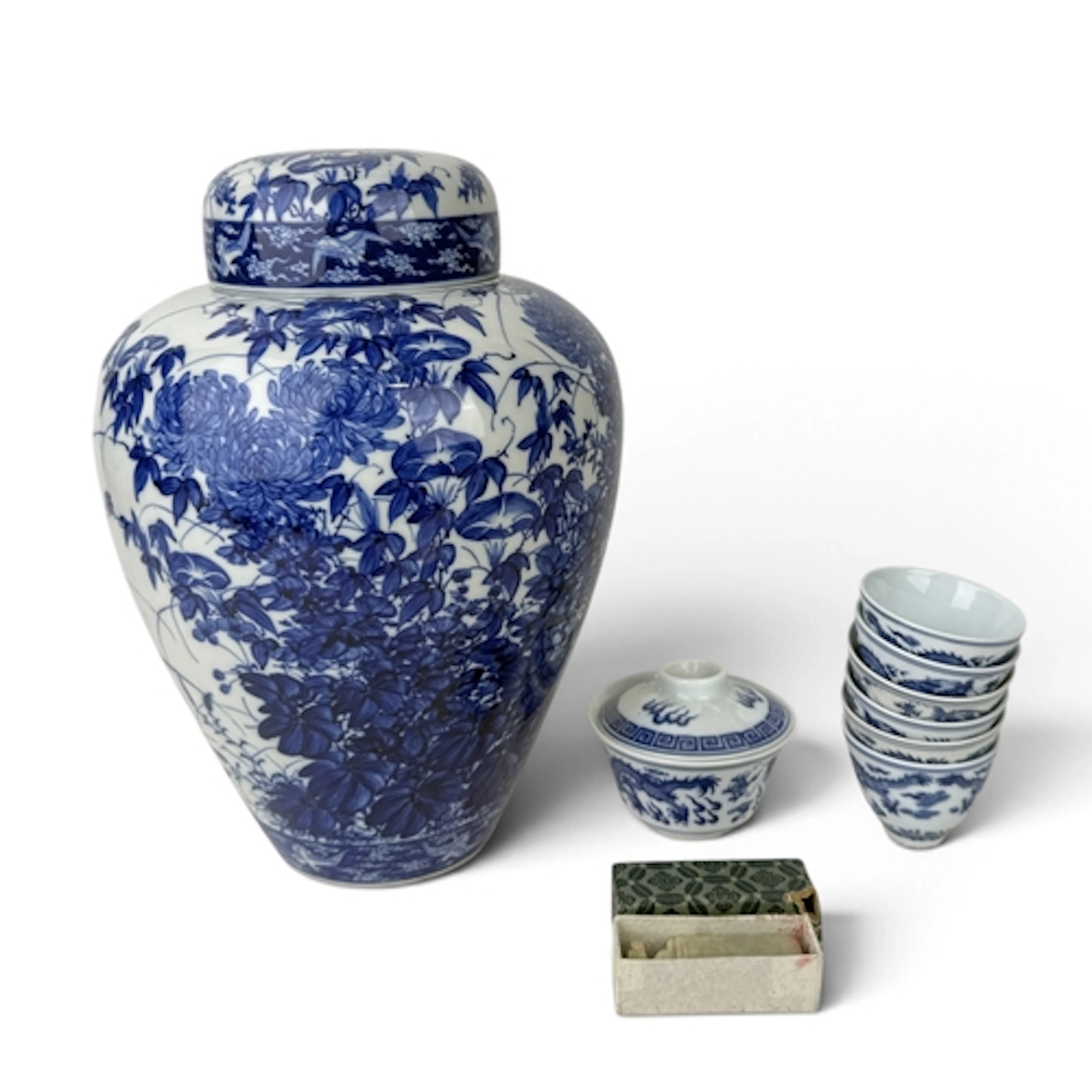 A JAPANESE BLUE AND WHITE PAINTED JAR AND COVER 34cm H Toget...