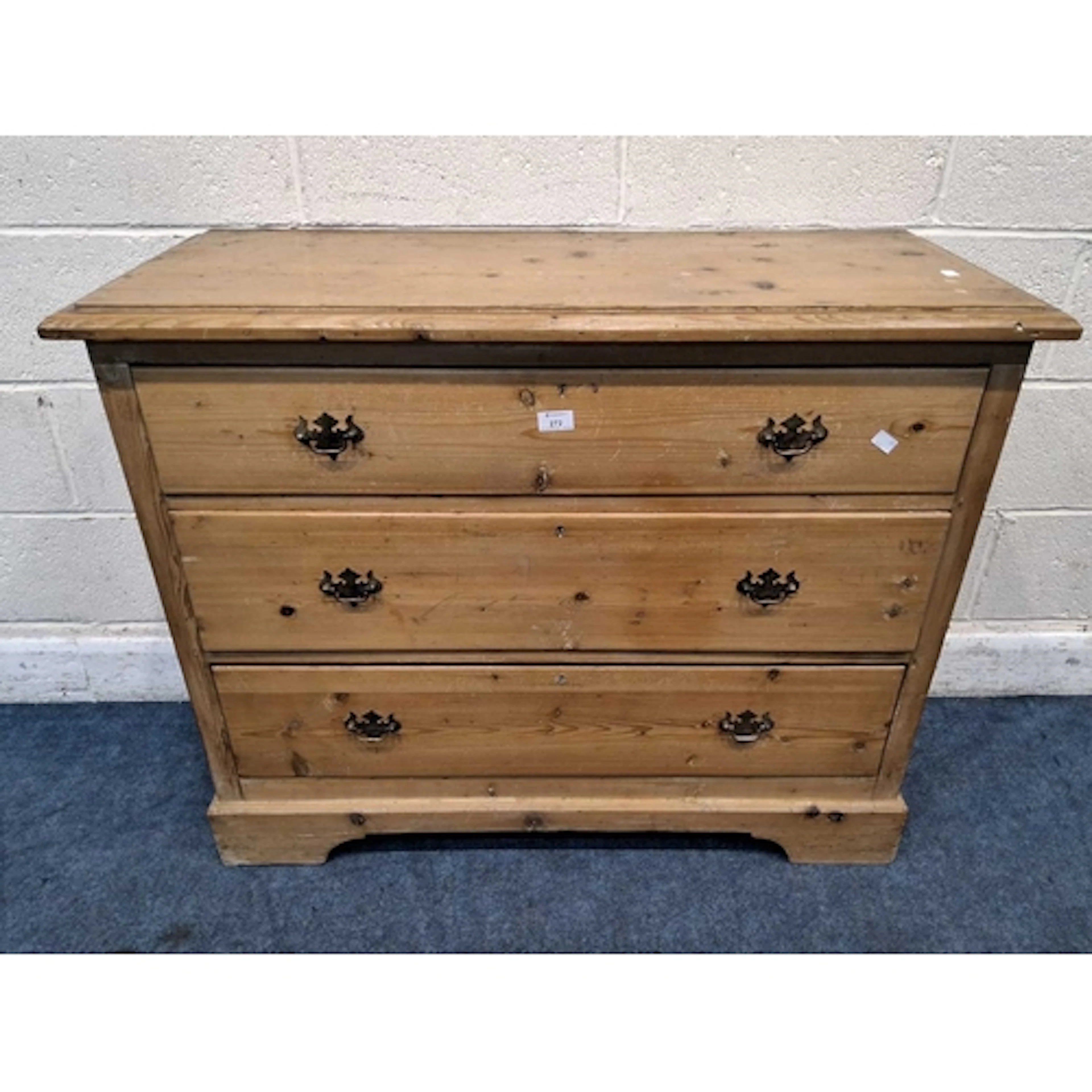 A 19TH CENTURY PINE CHEST OF THREE LONG DRAWERS (width 105c...