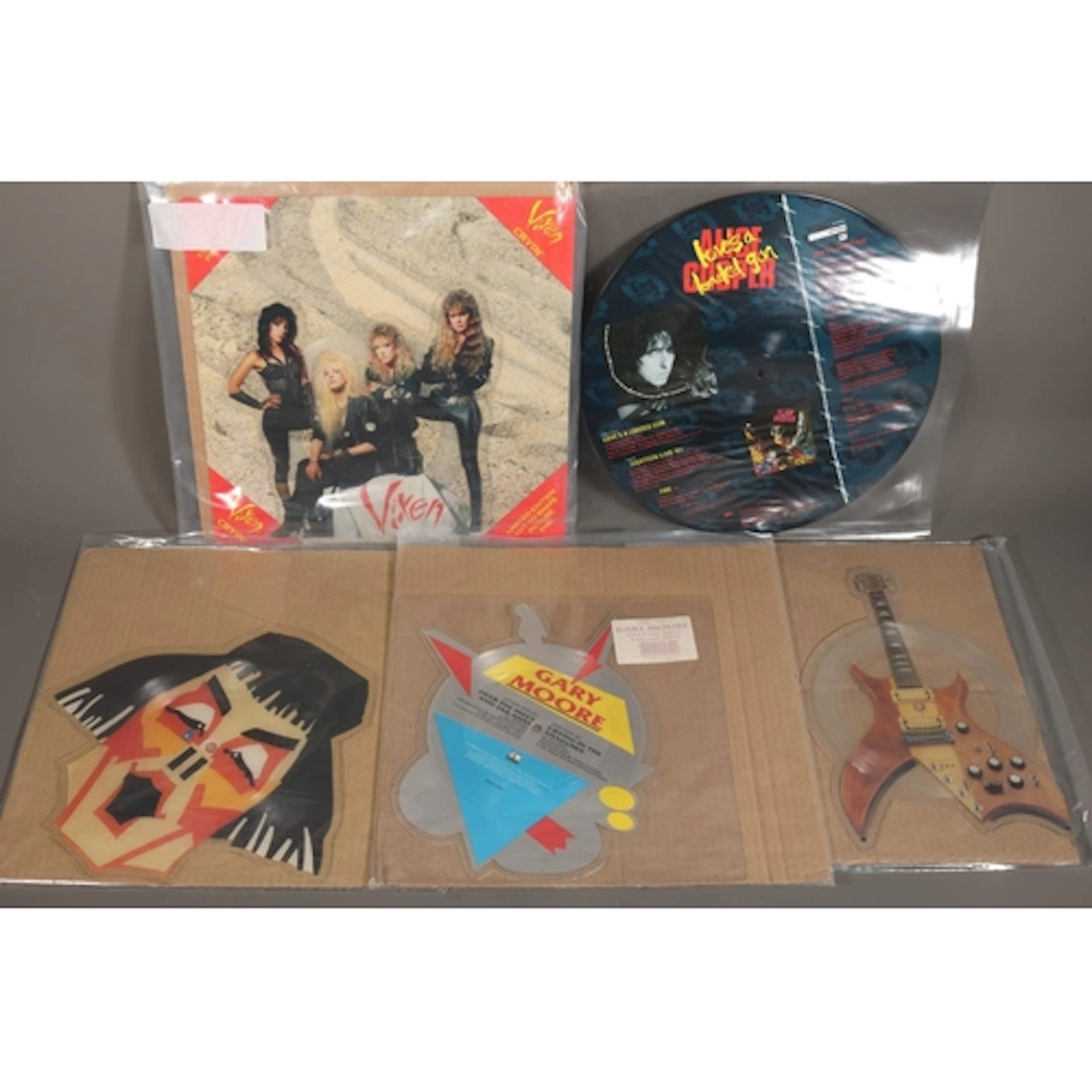 Box containing mainly picture disc cut outs to include Vixen...
