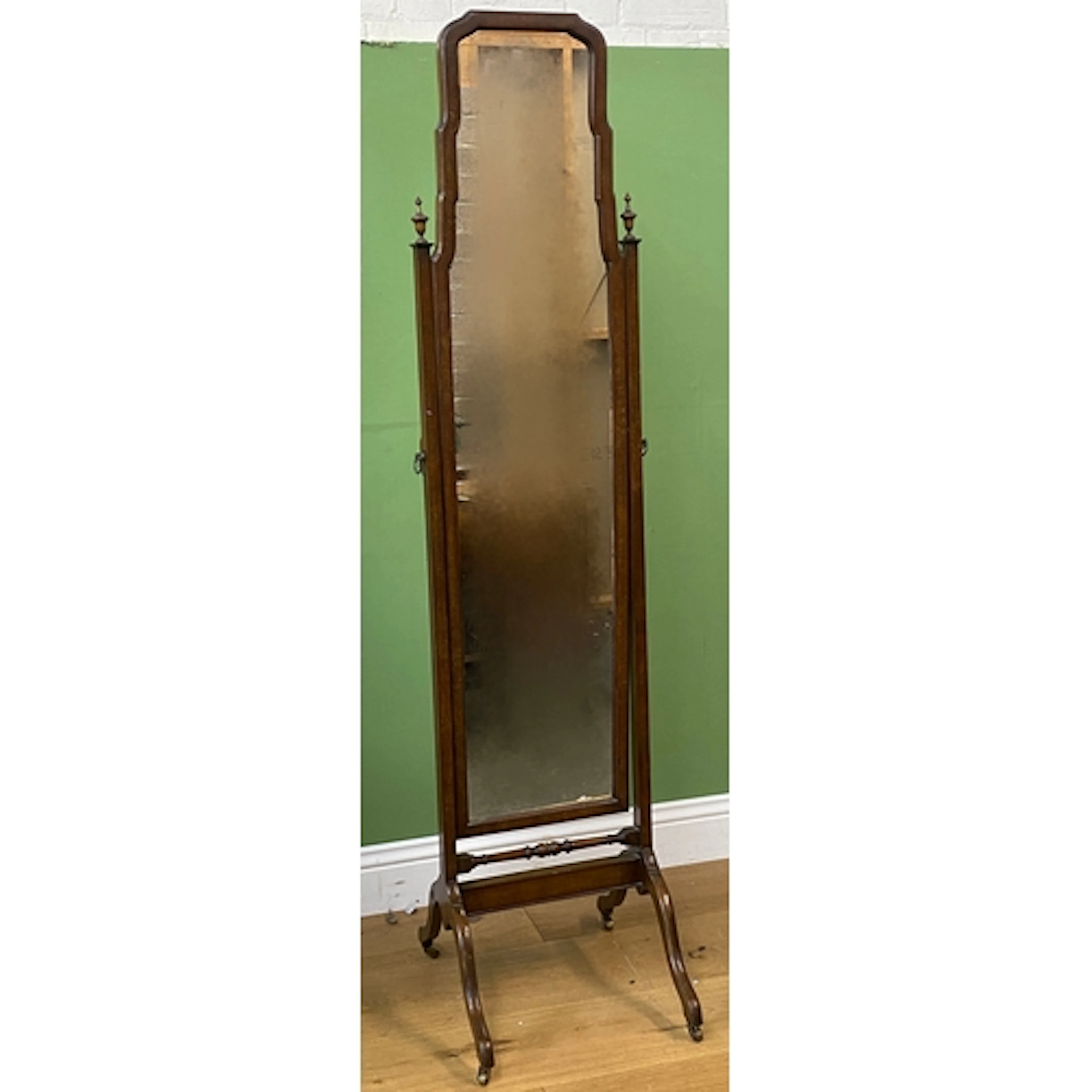 A 20th century cheval mirror with shaped plate, 174cmH