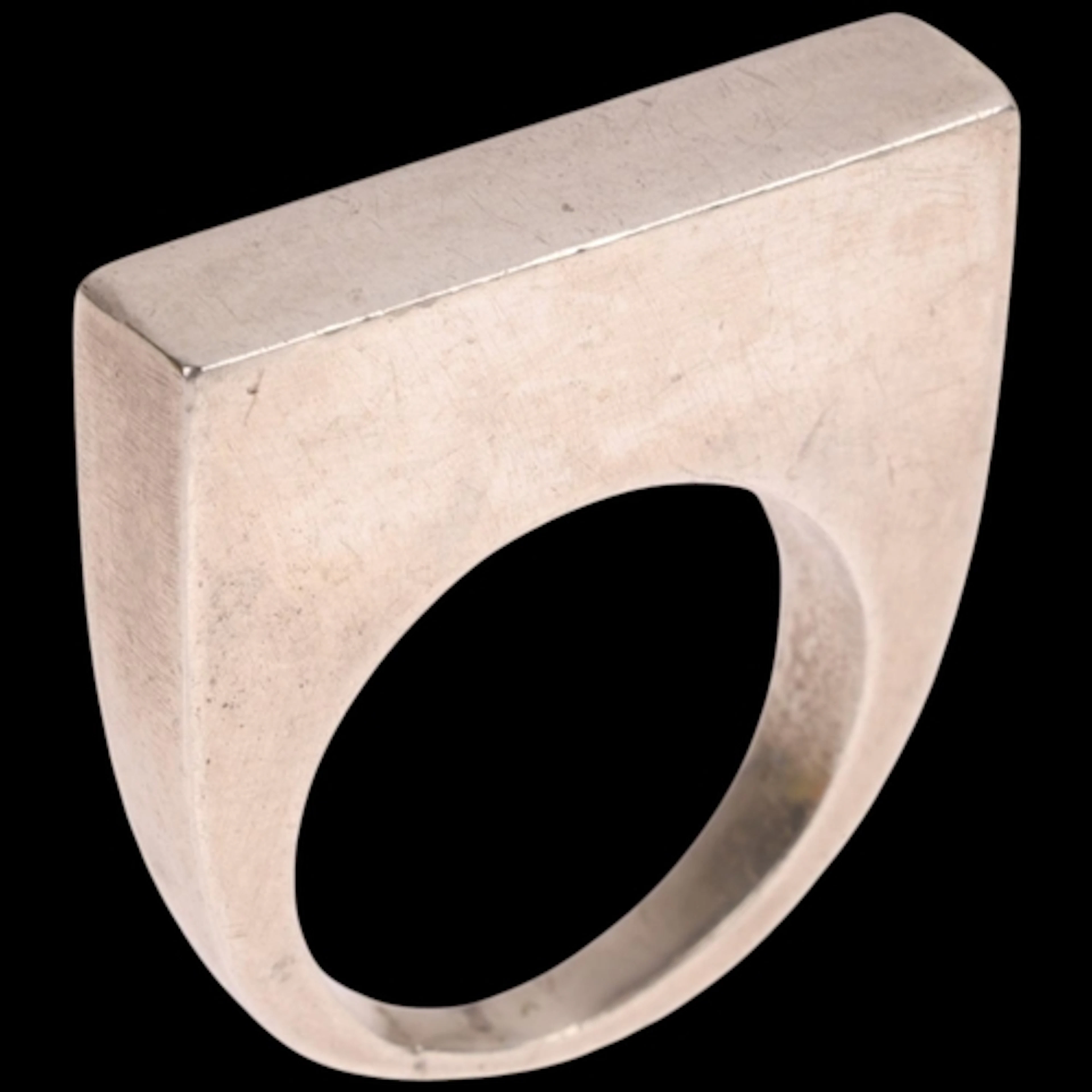 A Continental sterling silver panel ring, plain rectangular ...