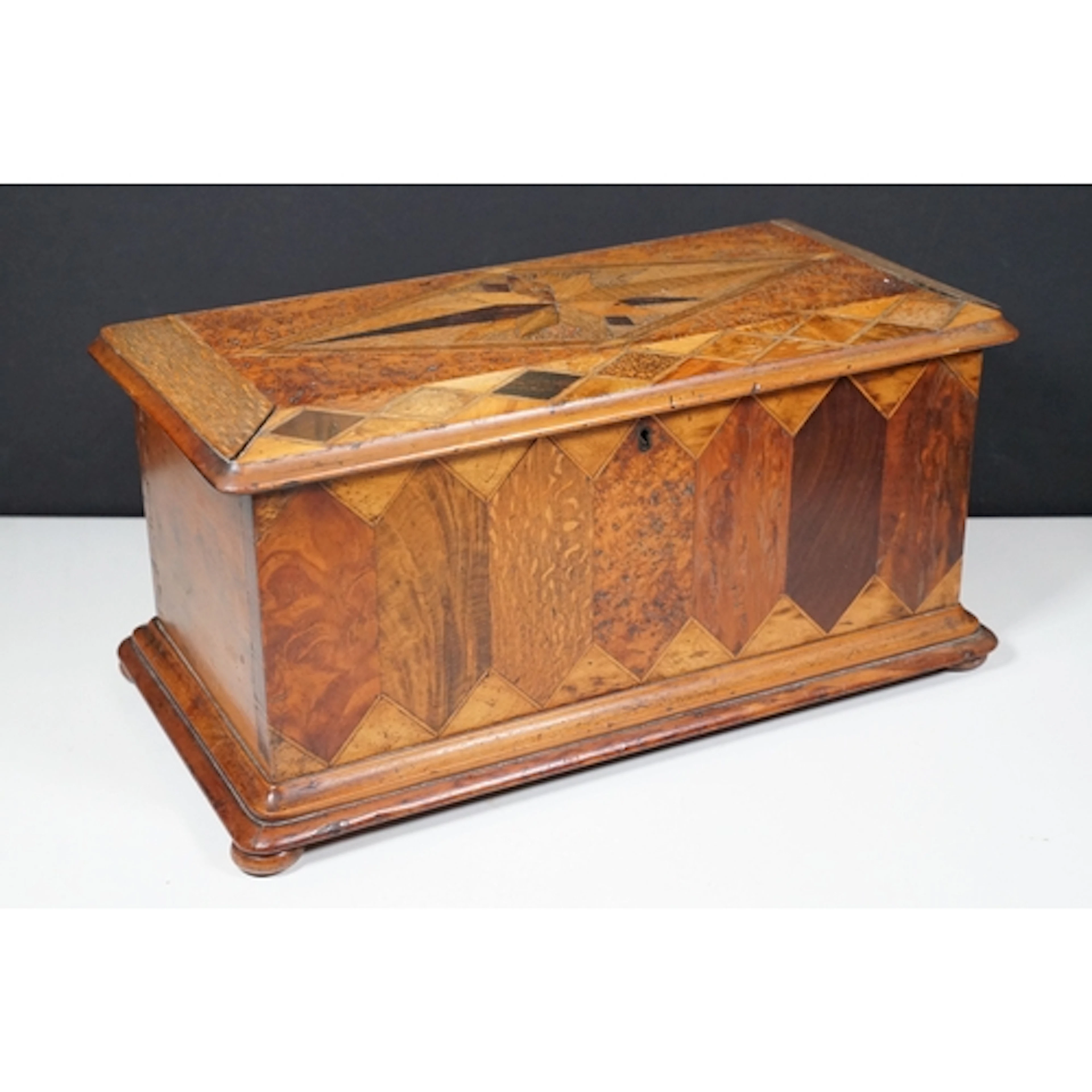 Mixed wood marquetry specimen jewellery box with two lift ou...