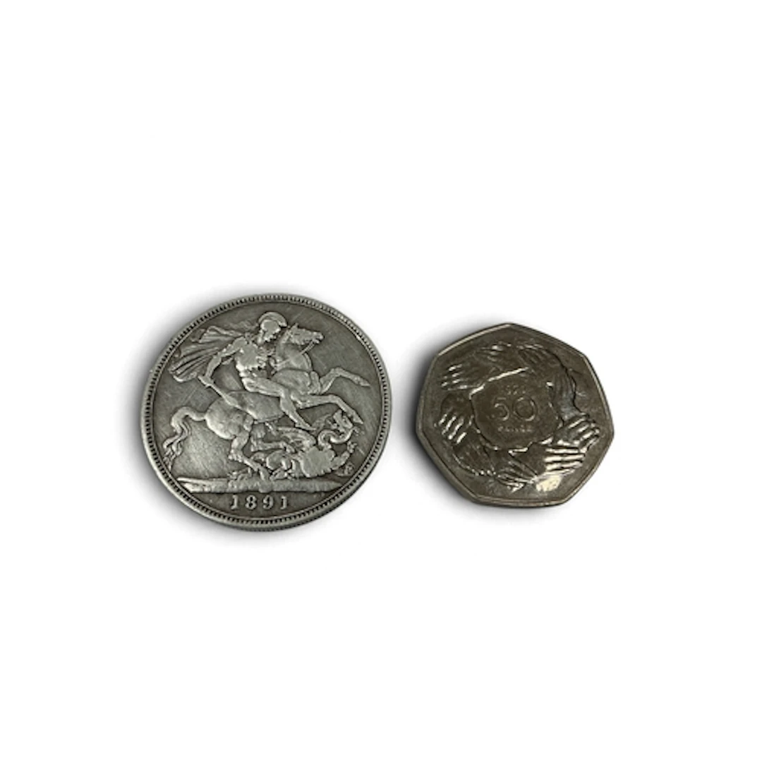 1891 GB Victoria Silver Crown, together with a 1973 50p.