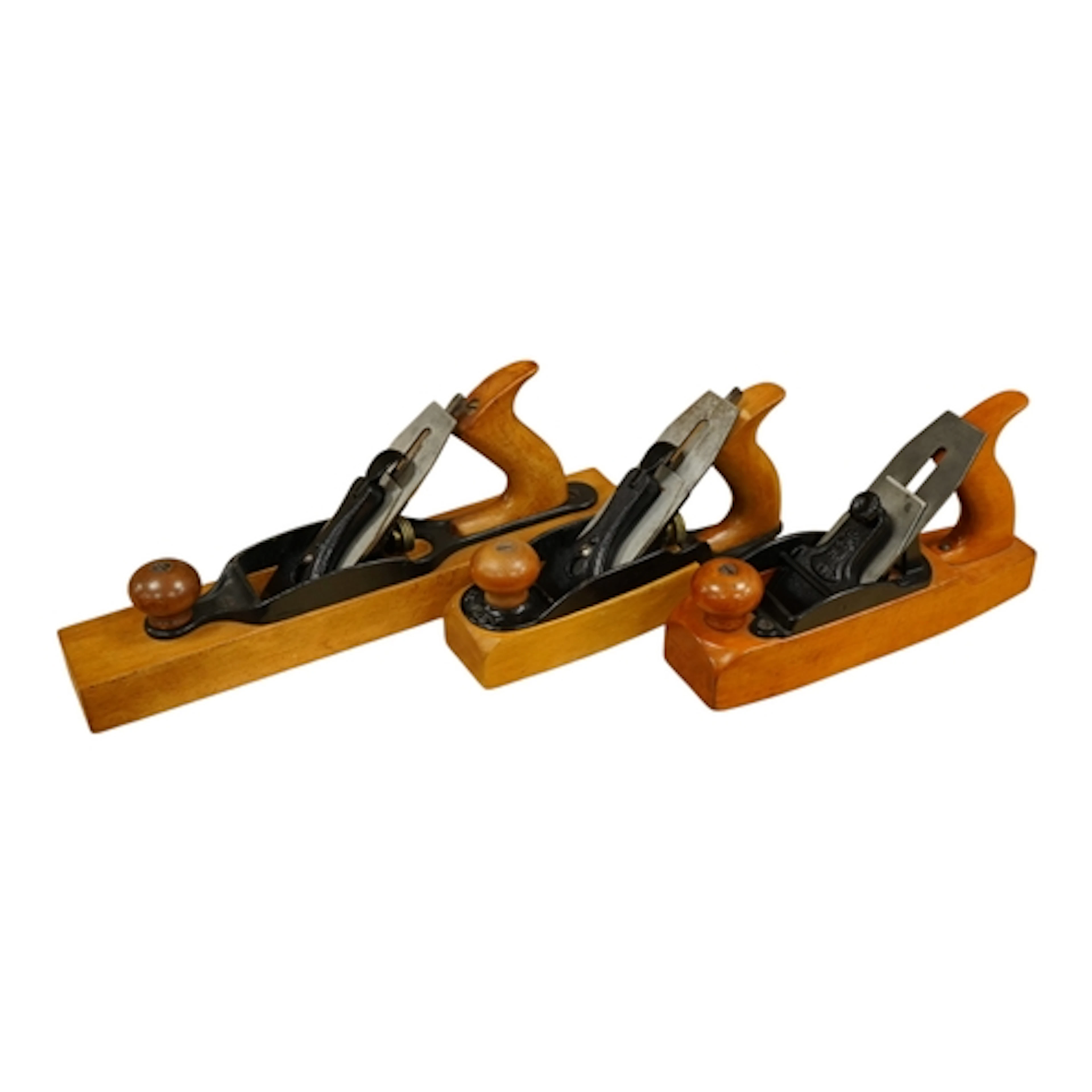 Three Stanley Bailey transitional wood bottom planes; a No.2...