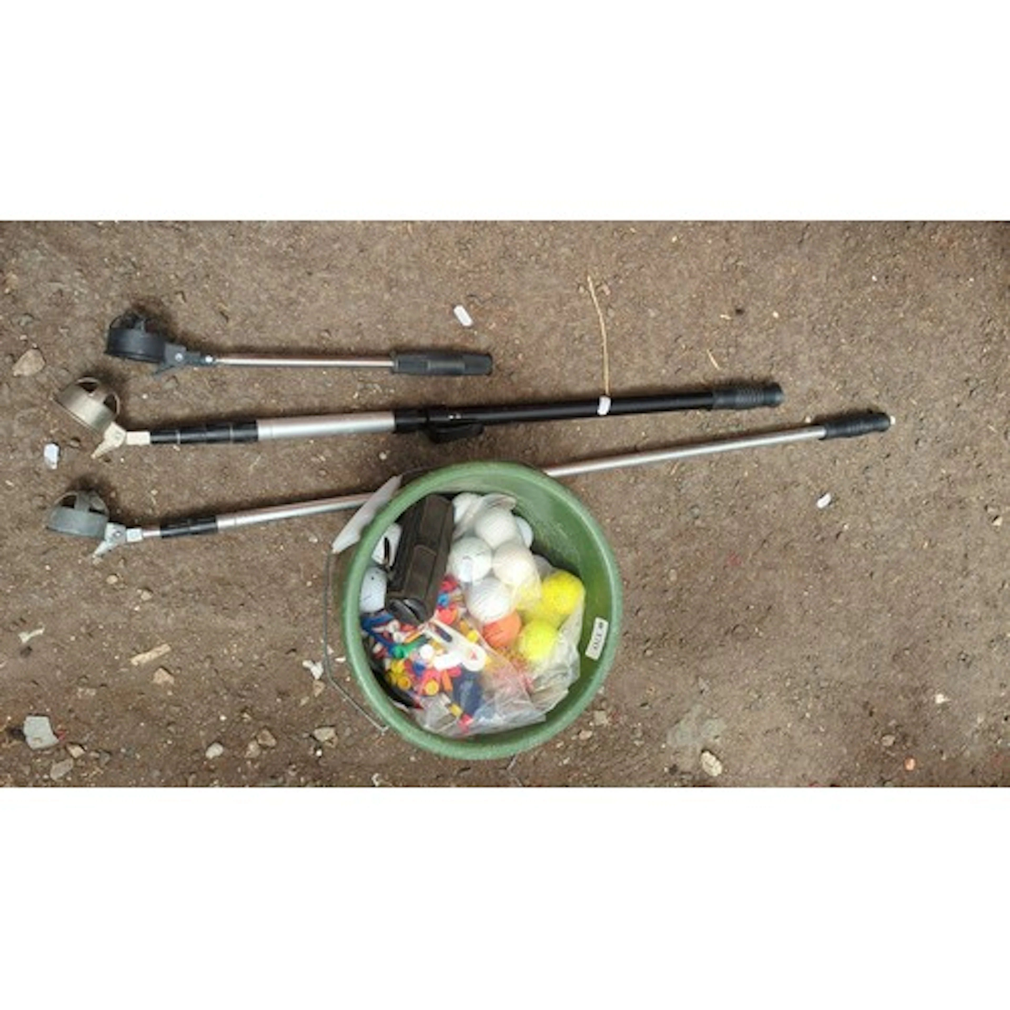 A group of golf practice accessories comprising three telesc...