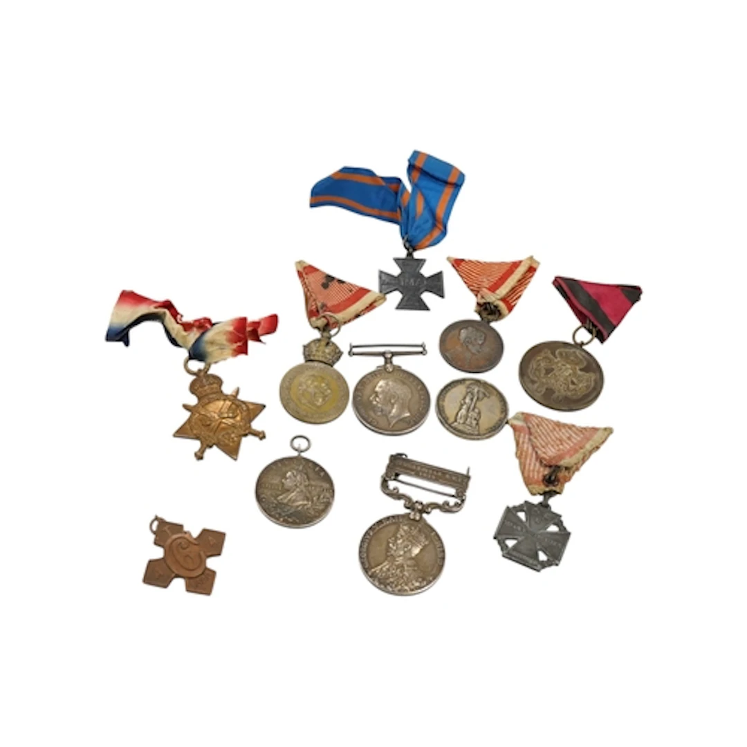 Eleven medals including; a George V medal trio awarded to 20...