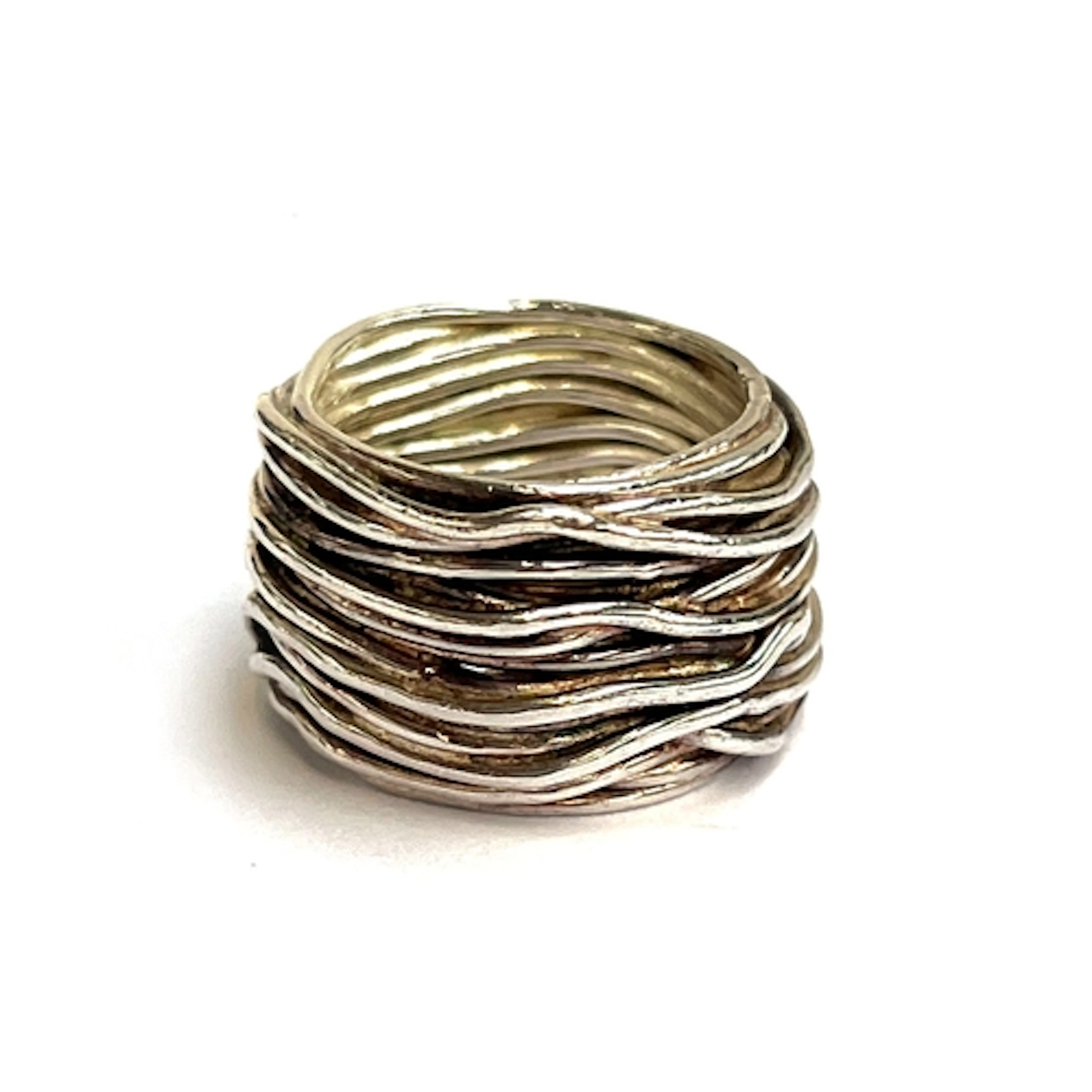 A heavy unmarked silver ring of wrapped wire form, size M, 1...