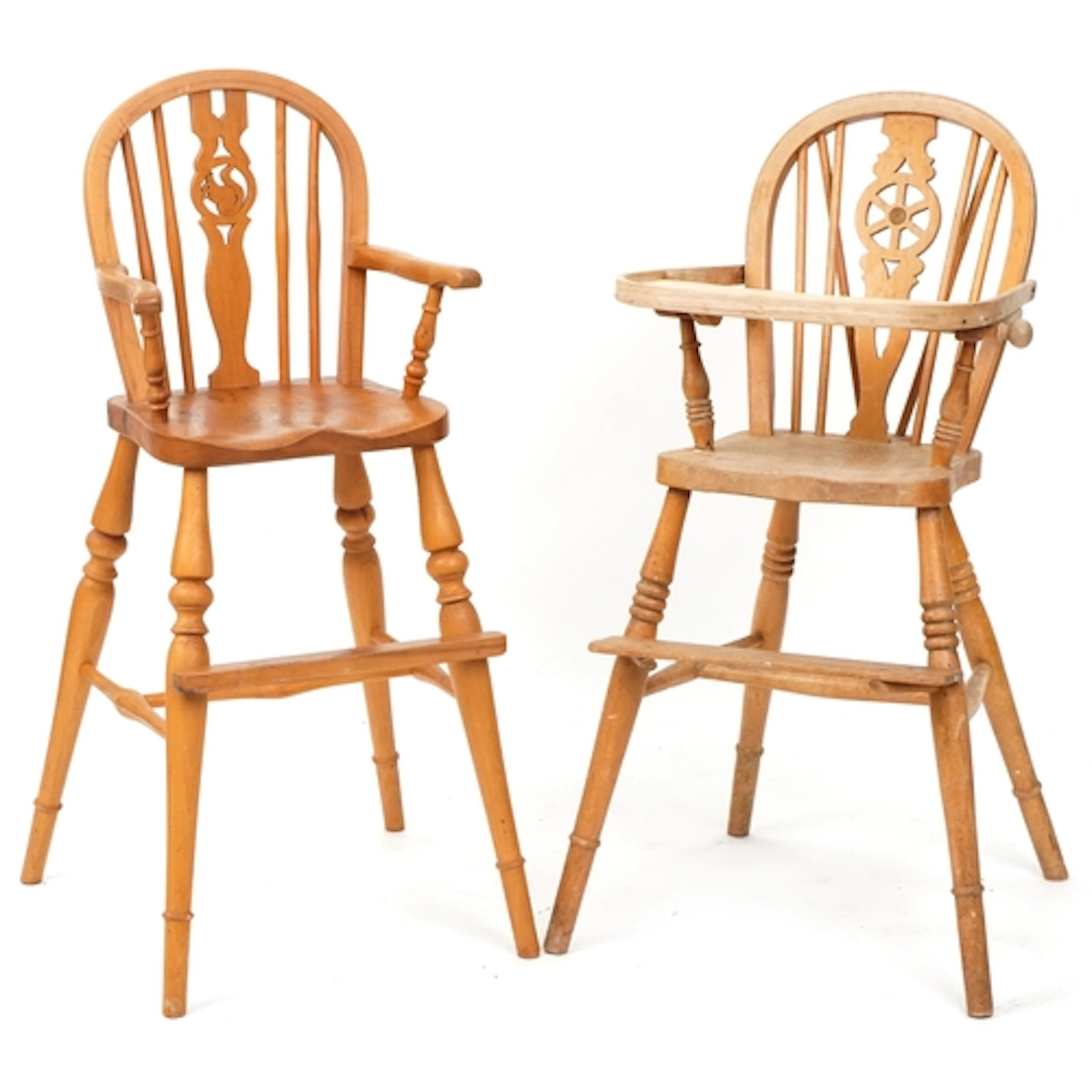 A 20th century pine Windsor child's highchair together with ...