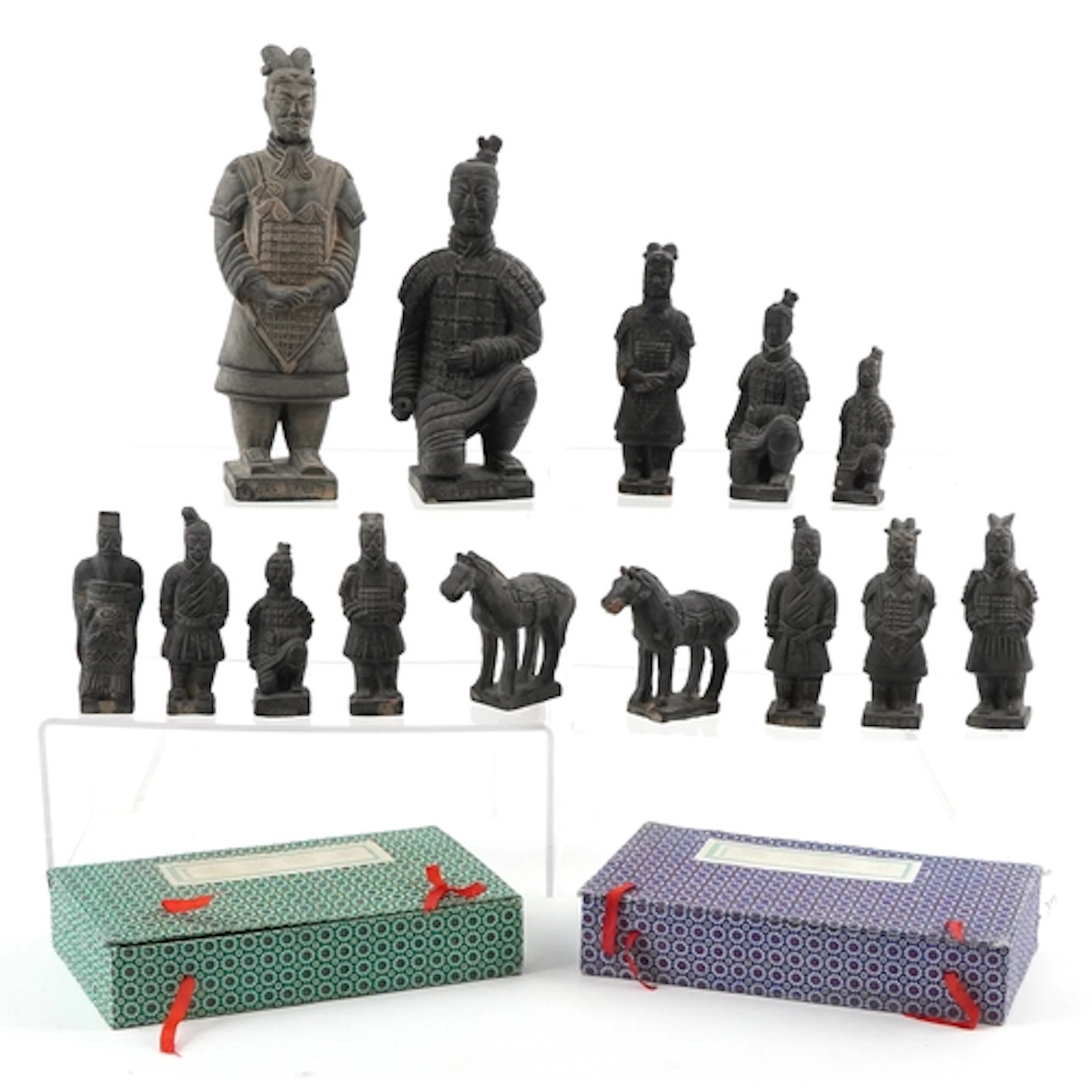 Collection of Chinese Terracotta Army style figurines, the l...