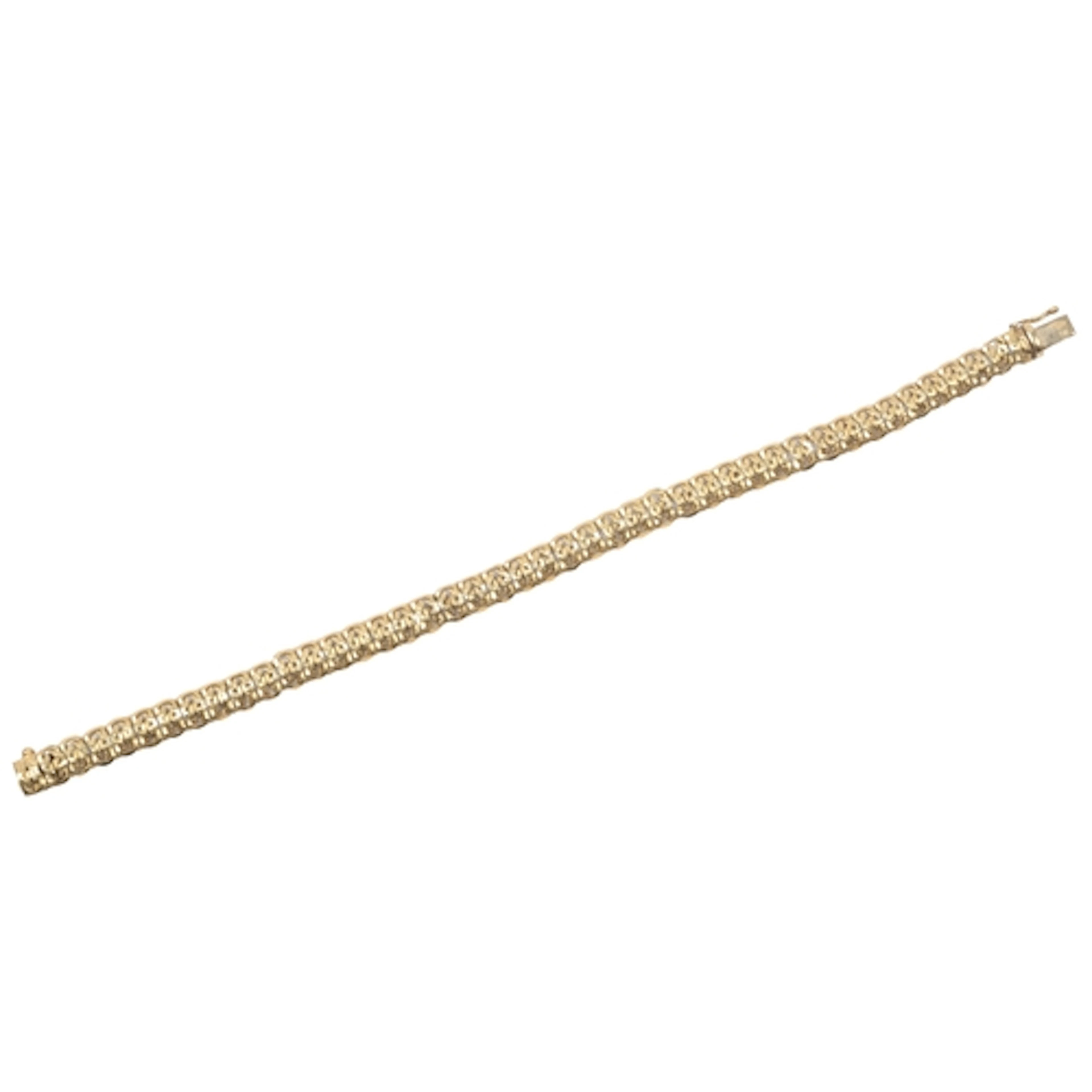 A gold bracelet, composed of fancy linking with engraved det...
