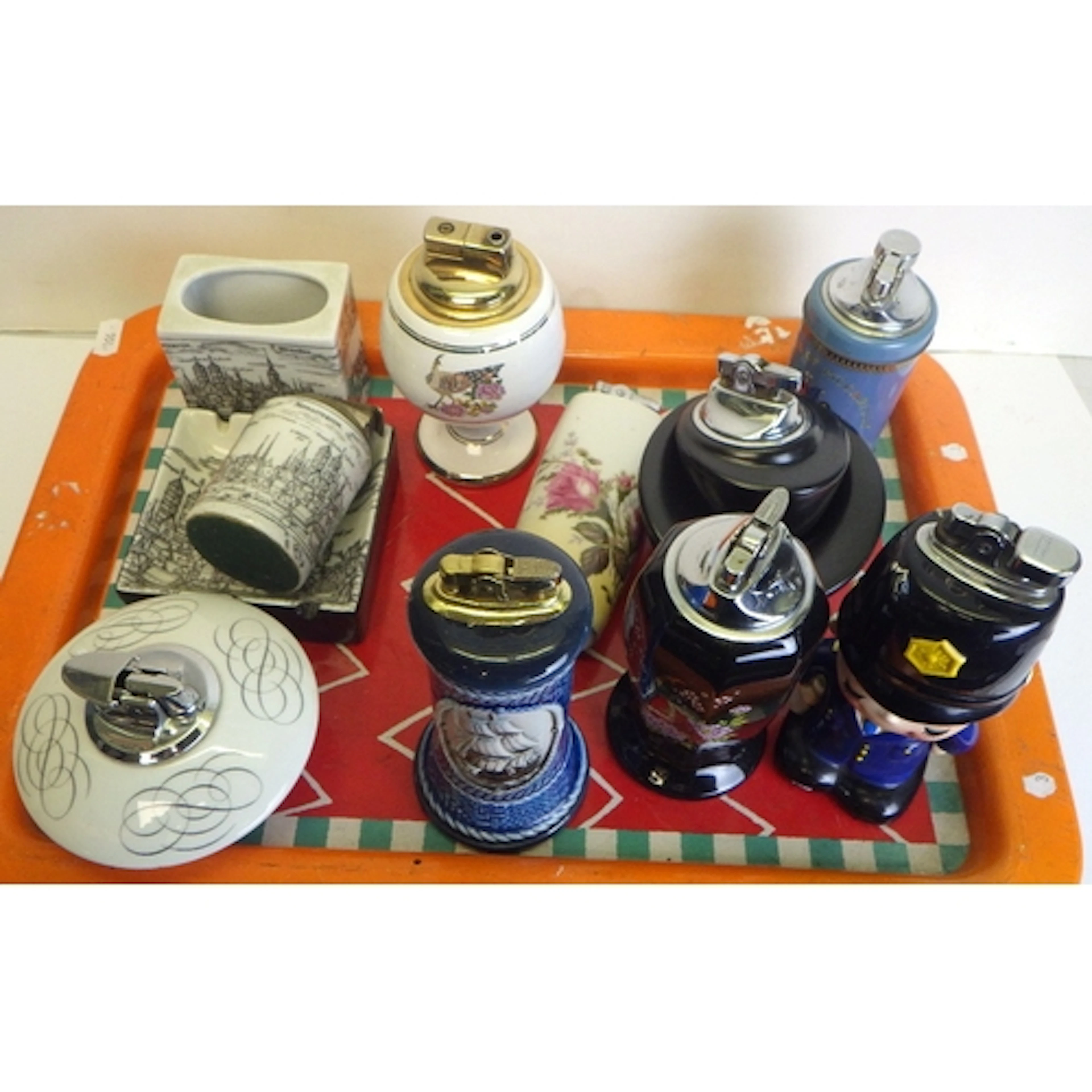 A group of misc table lighters